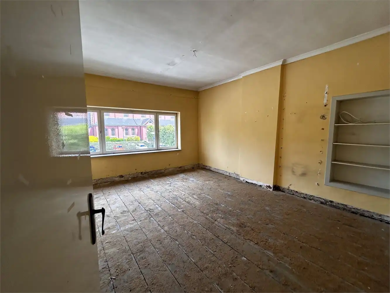 Te renoveren handelshuis met woonst foto 31