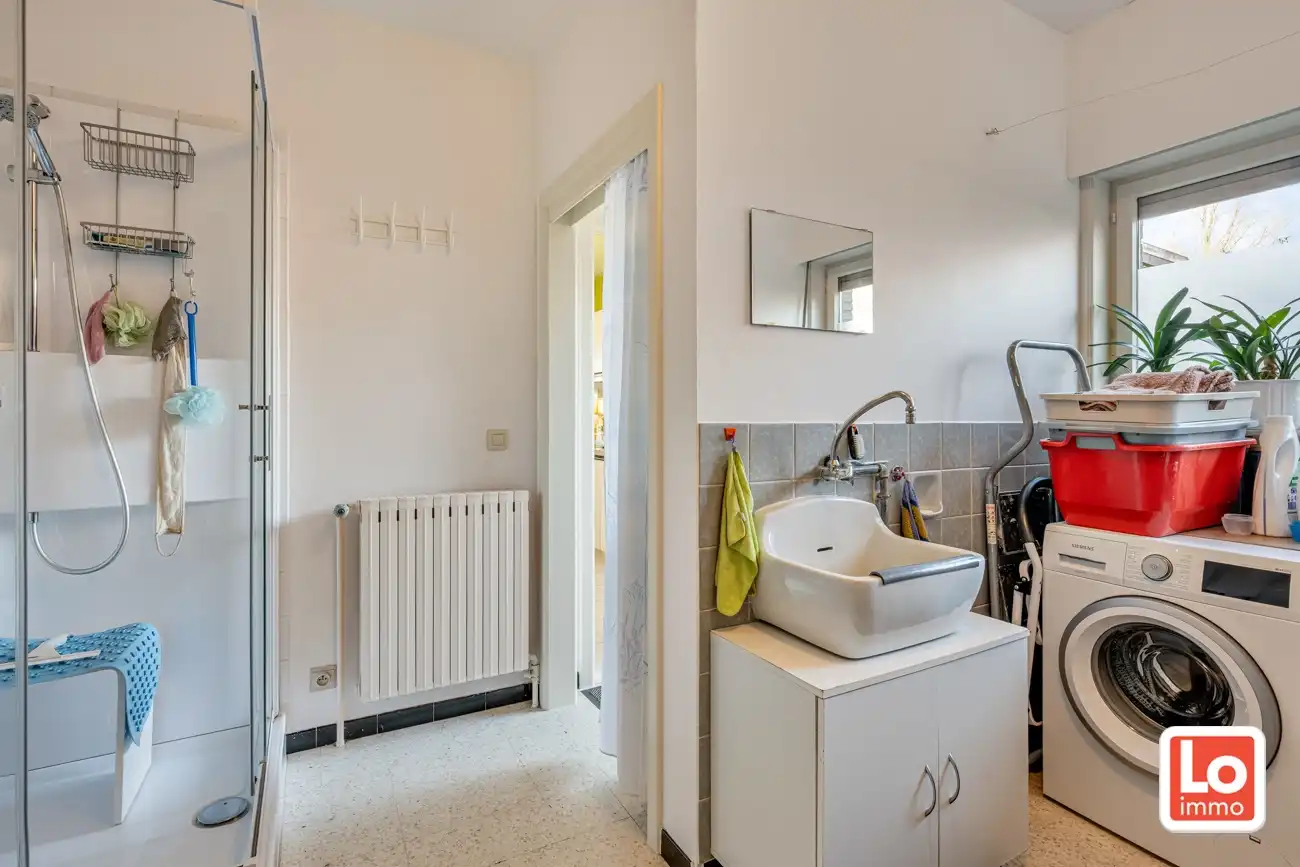 Degelijke open gelijkvloerse woning met inpandige garage en grote tuin op een groene toplocatie in Beervelde! foto 18