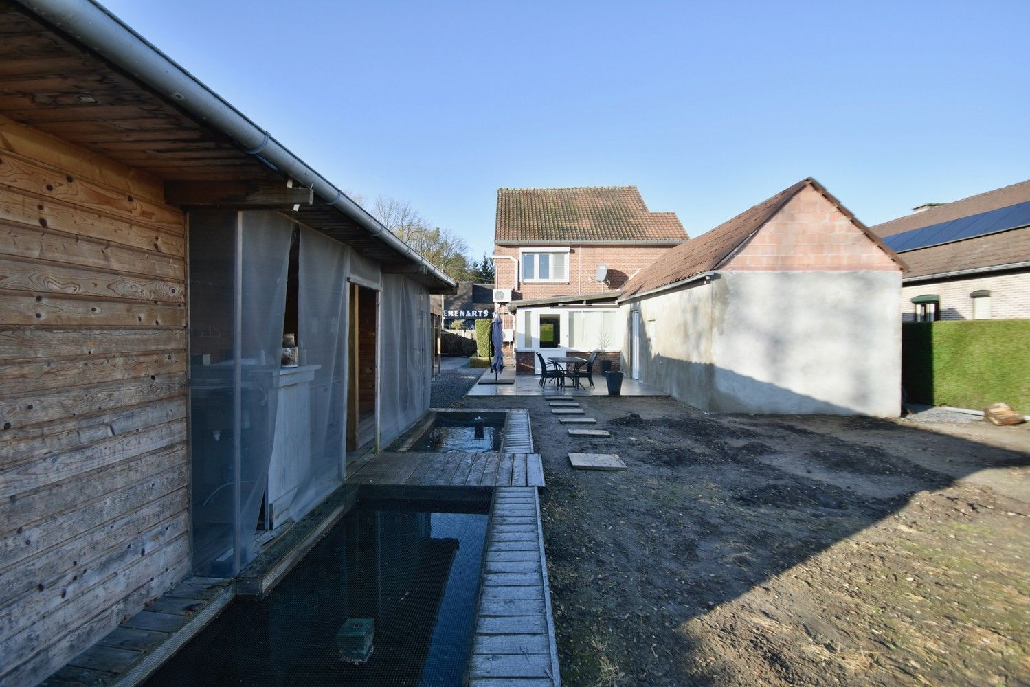 Instapklare, gemoderniseerde woning met 3 slaapkamers met aangename tuinkamer/praktijkruimte, gelegen in het mooie Opgrimbie foto 21