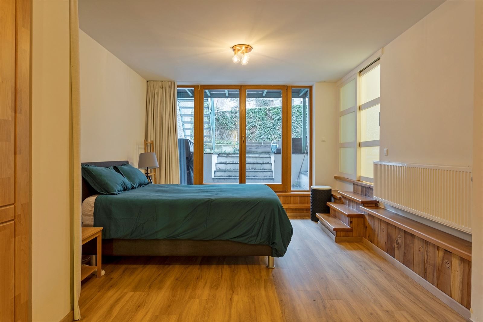 Gelijkvloers gemeubeld 1 slaapkamer appartement met tuin op A-locatie foto 14