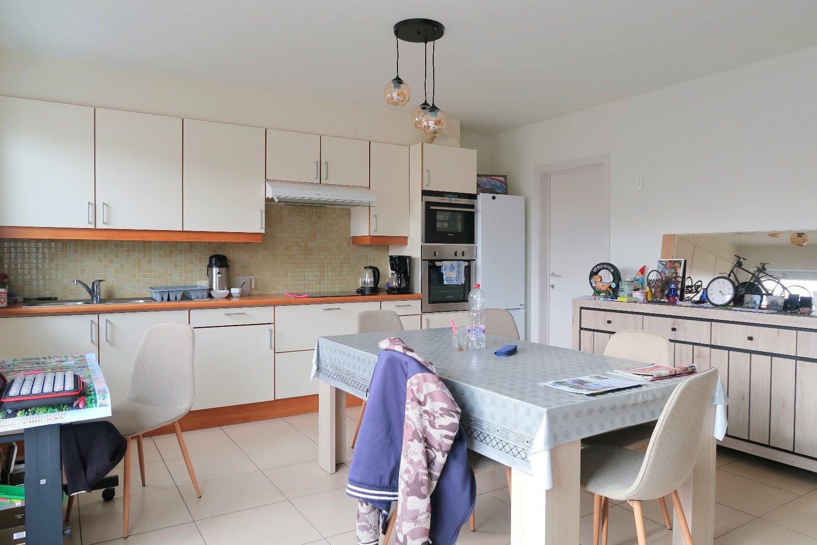 Opbrengsteigendom met 3 appartementen en 3 garageboxen. Ideale investering! foto 7