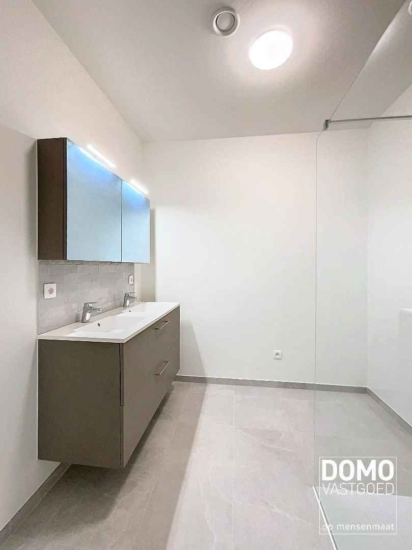 Energiezuinig gelijkvloers nieuwbouwappartement appartement met tuin ondergrondse autostandplaats - 108m² - EPC A foto 6