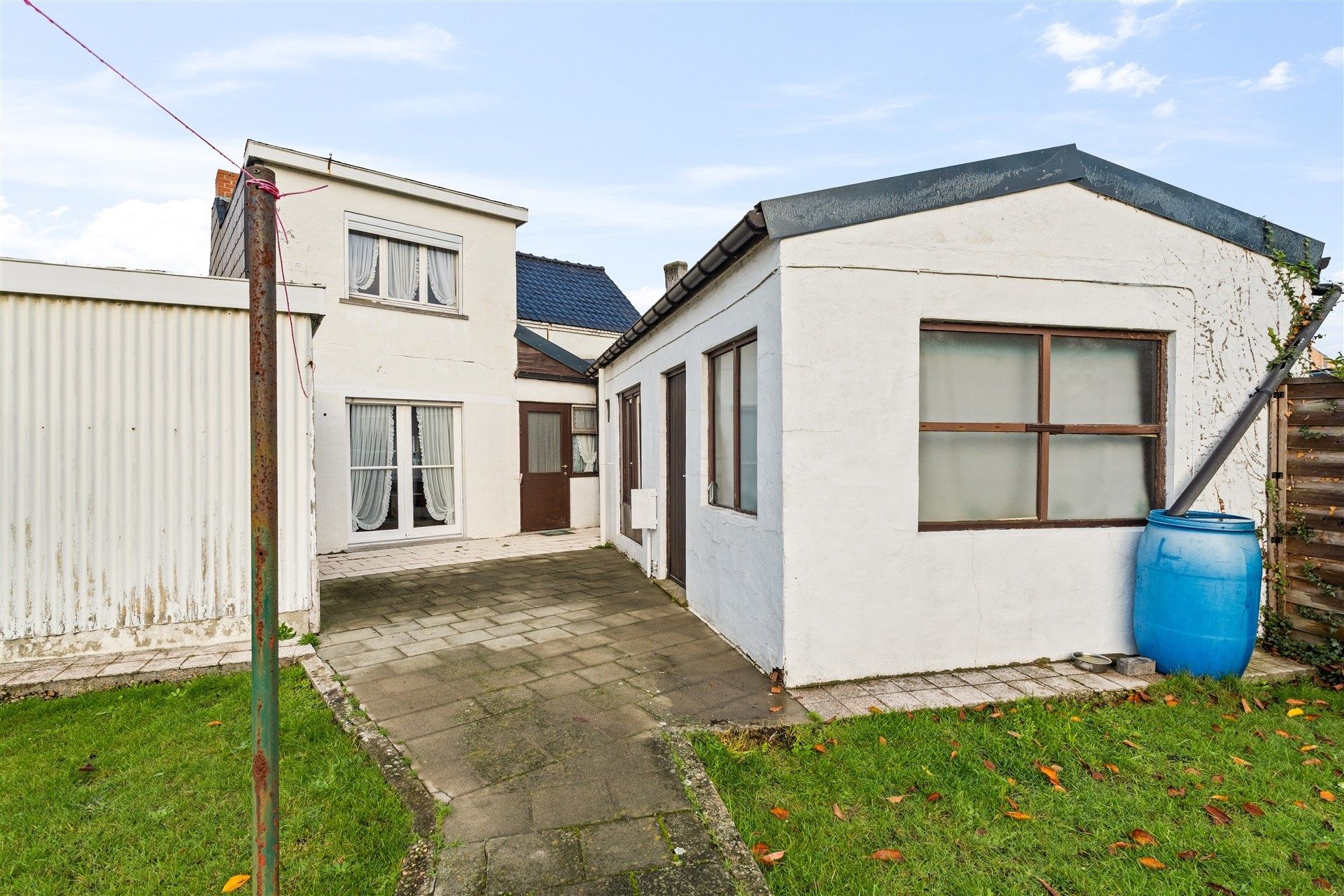 op te knappen woning met leuke tuin en inpandige garage. foto 11