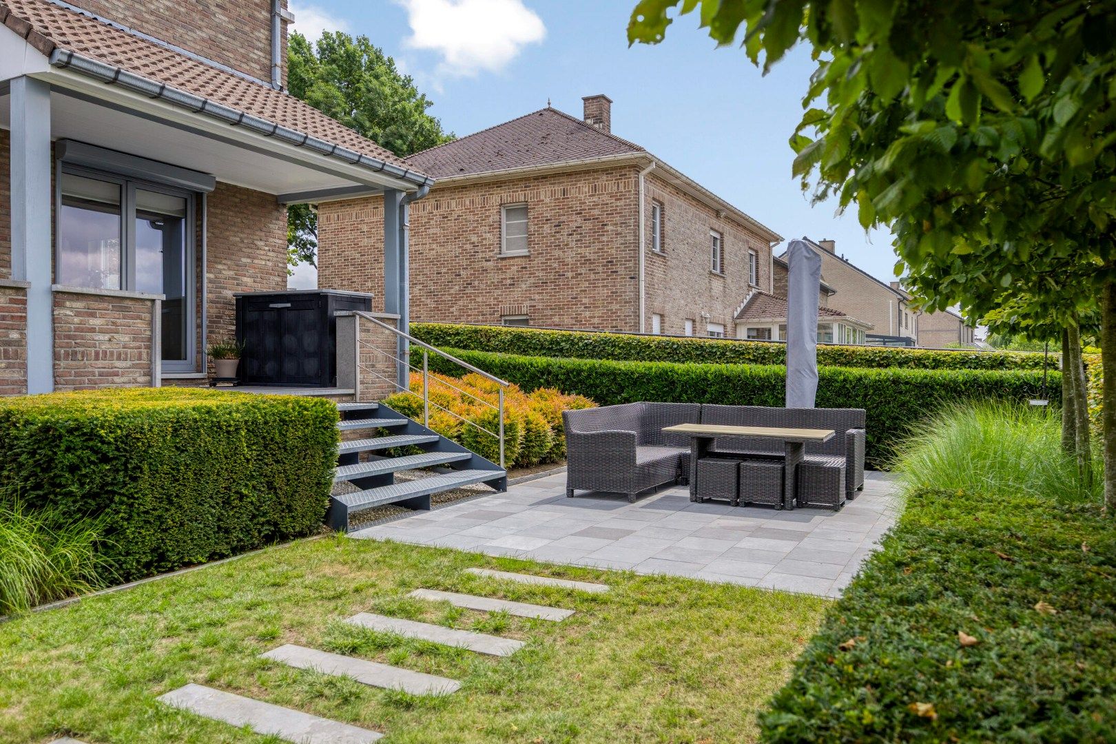 Ruime open bebouwing met zonnige tuin en mogelijkheid praktijkruimte foto 26