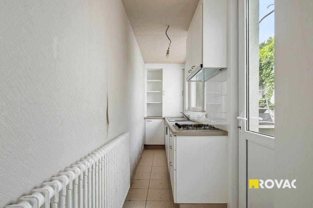 Te renoveren handelspand met woonst in hartje Izegem foto 13