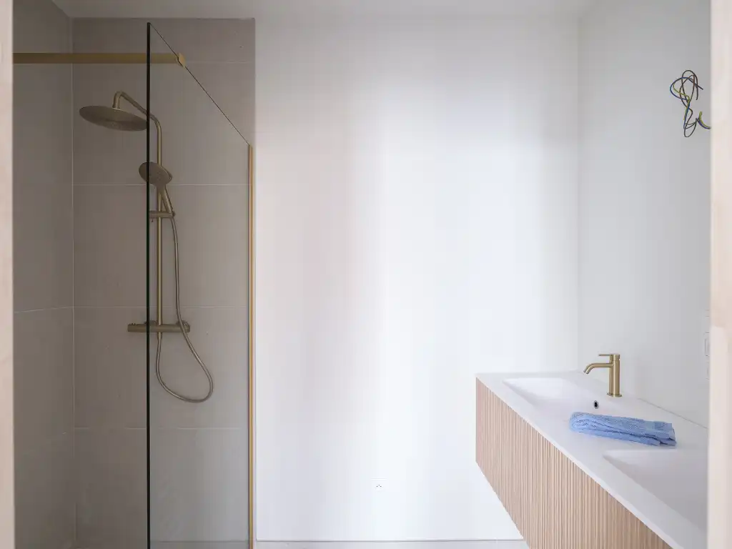 Uniek townhouse-appartement met o.m. 4 slaapkamers, 3 badkamer en een ruim terras. foto 15