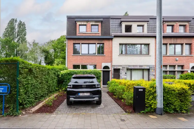 Hoofdfoto van de publicatie: Gezellige gezinswoning met fijne tuin.