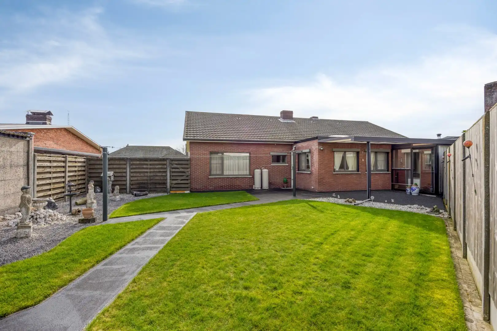 Ruim ingedeelde gelijkvloers woning op een mooi breed perceel van 812 m². foto 37