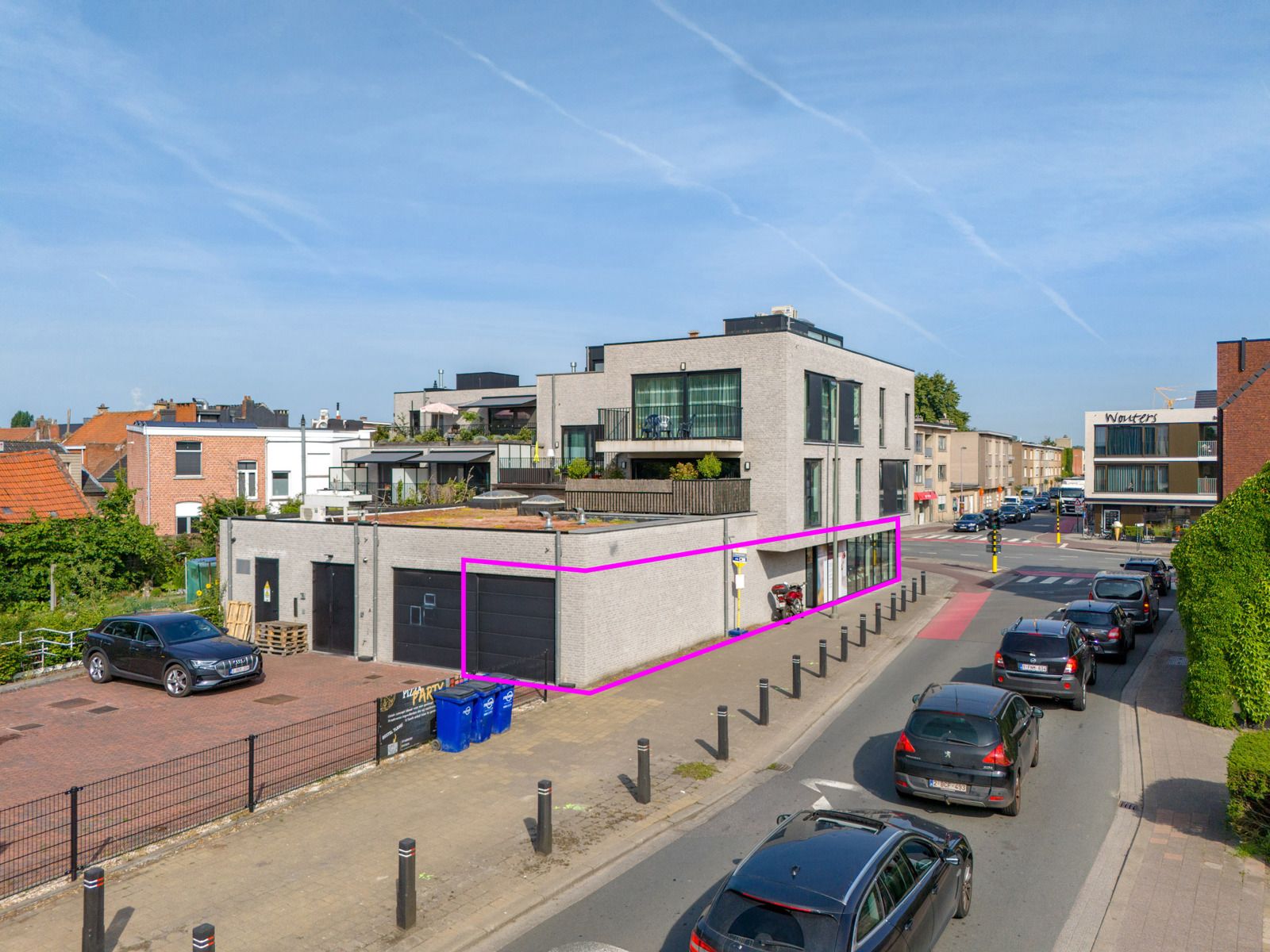 Handelsgelijkvloers (80m²) in het centrum van Stabroek met inpandige garage!  foto 12