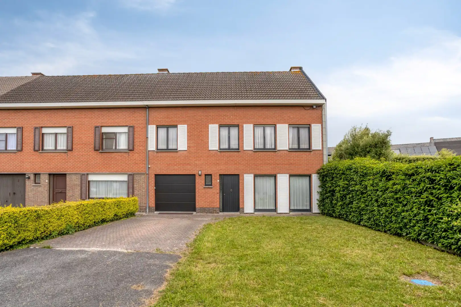 Degelijke woning met 4 slaapkamers, garage en tuin! foto {{pictureIndex}}