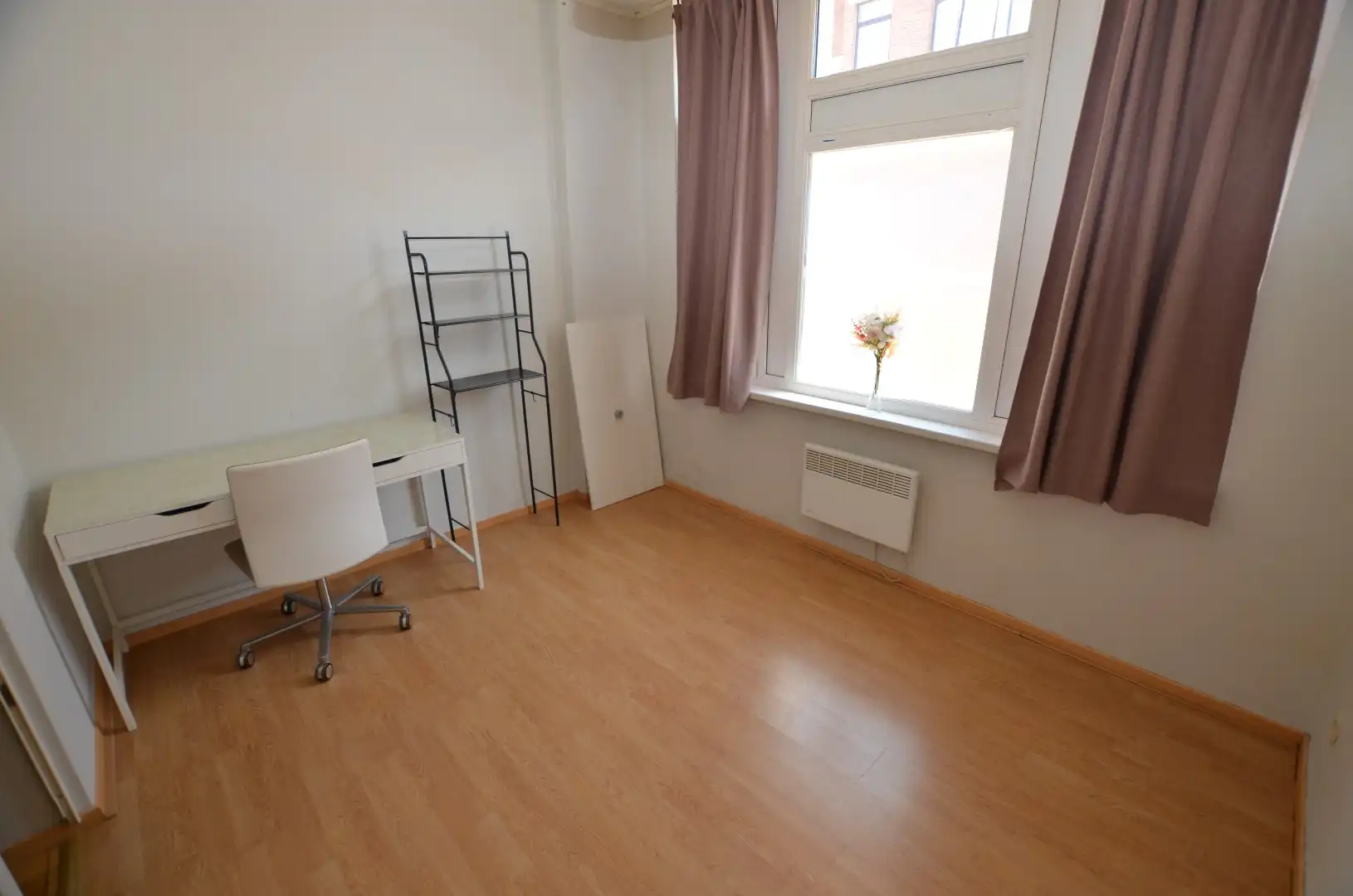Gelijkvloers appartement met grote koer foto 2
