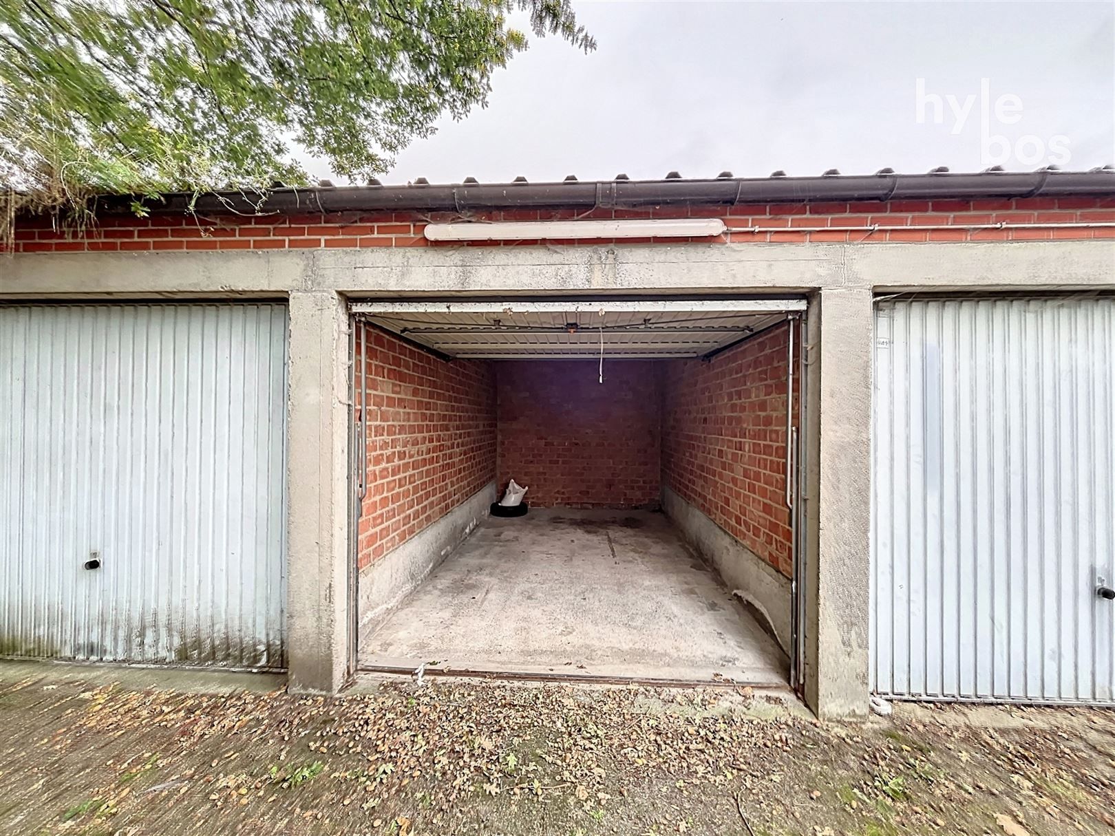 Gelijkvloers appartement met 2 slaapkamers, garage en ruime tuin foto 14