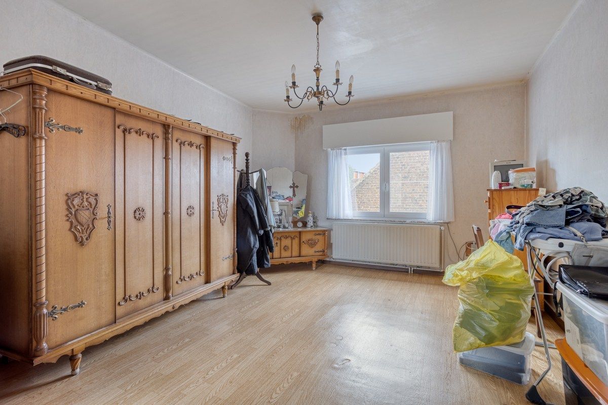Te renoveren woning en 2 bouwgronden foto 11