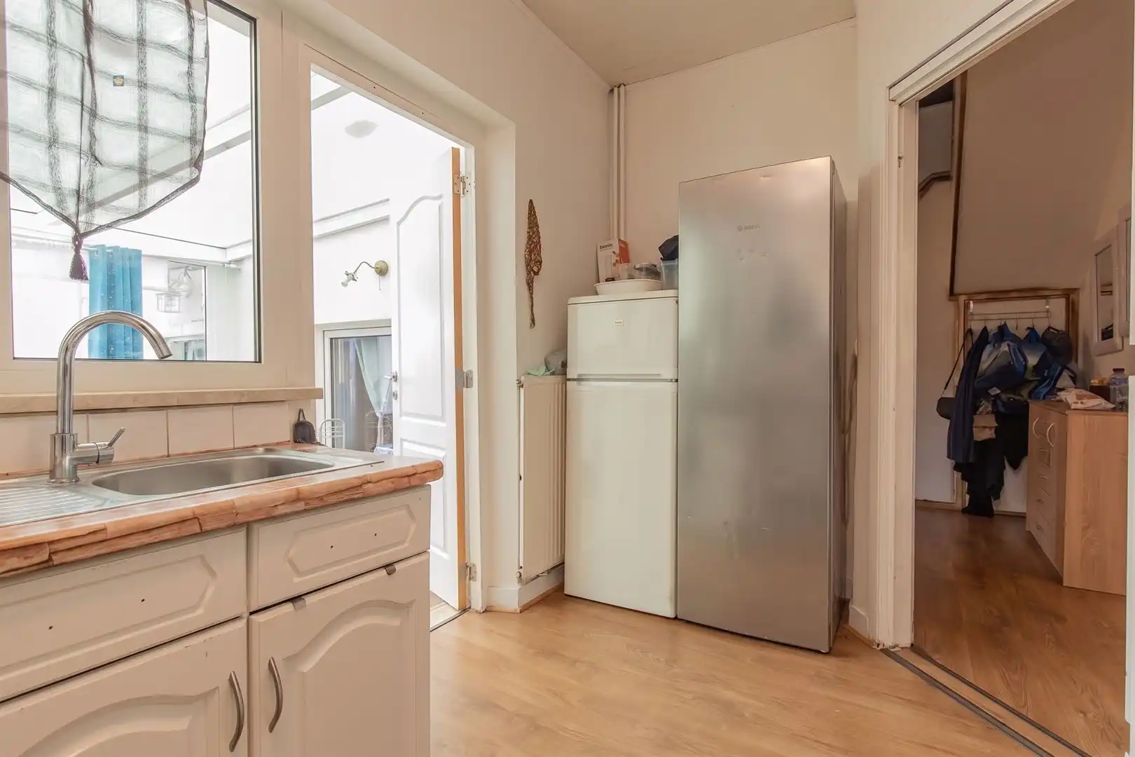 Opbrengsteigendom met handelsruimte en verhuurd duplex appartement in het centrum van Willebroek foto 18
