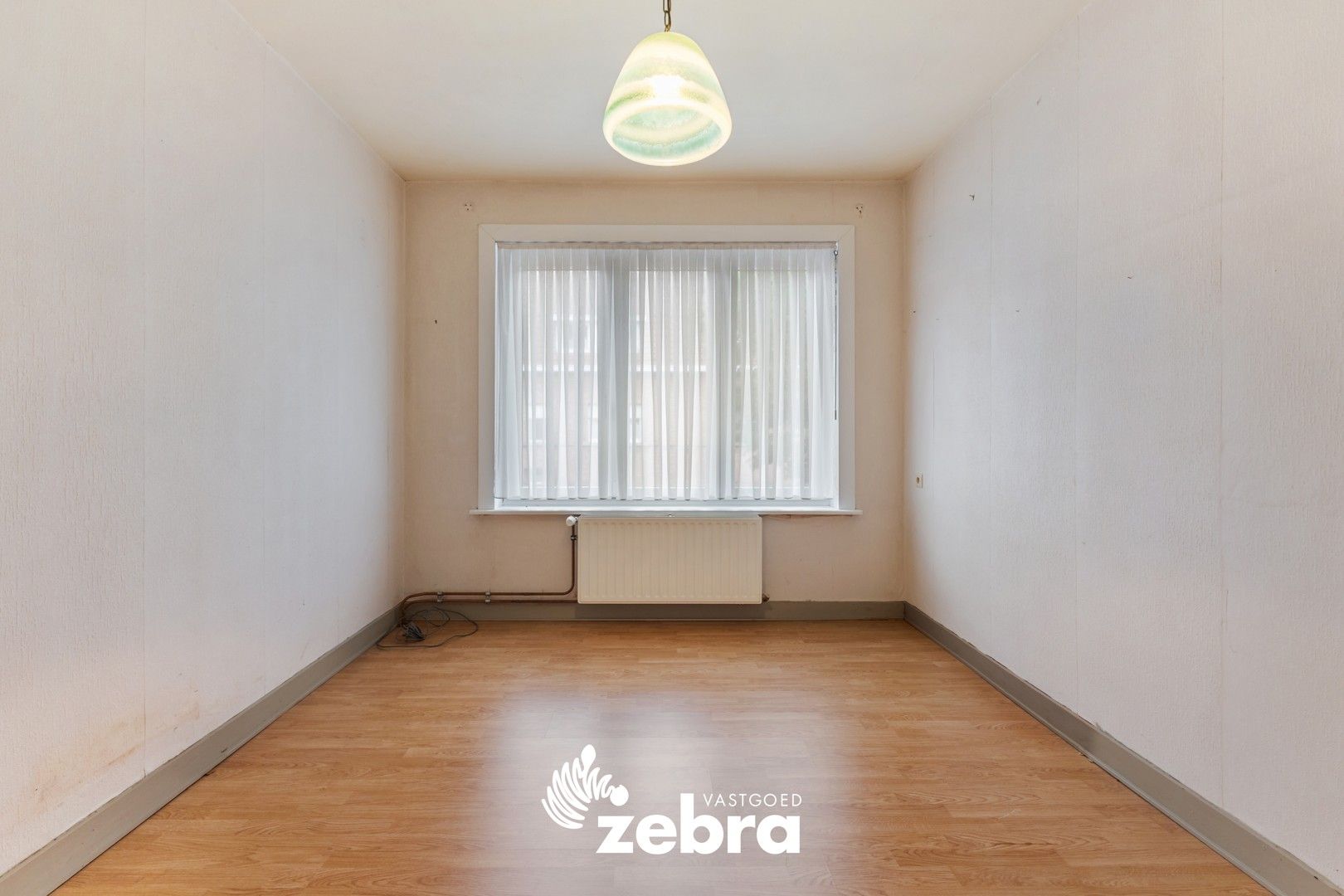Op te frissen woning met vier slaapkamers te Assebroek! foto 12