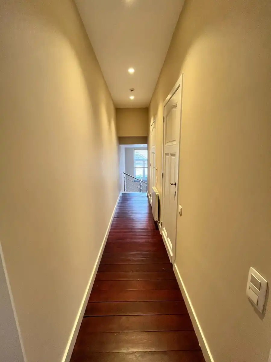 Gerenoveerd duplex appartement met tuin in centrum Leuven te huur foto 18