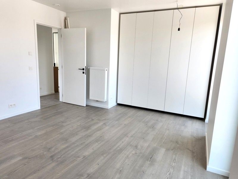 Prachtig 2 slaapkamer nieuwbouwappartement te huur in hartje Wielsbeke! foto 7