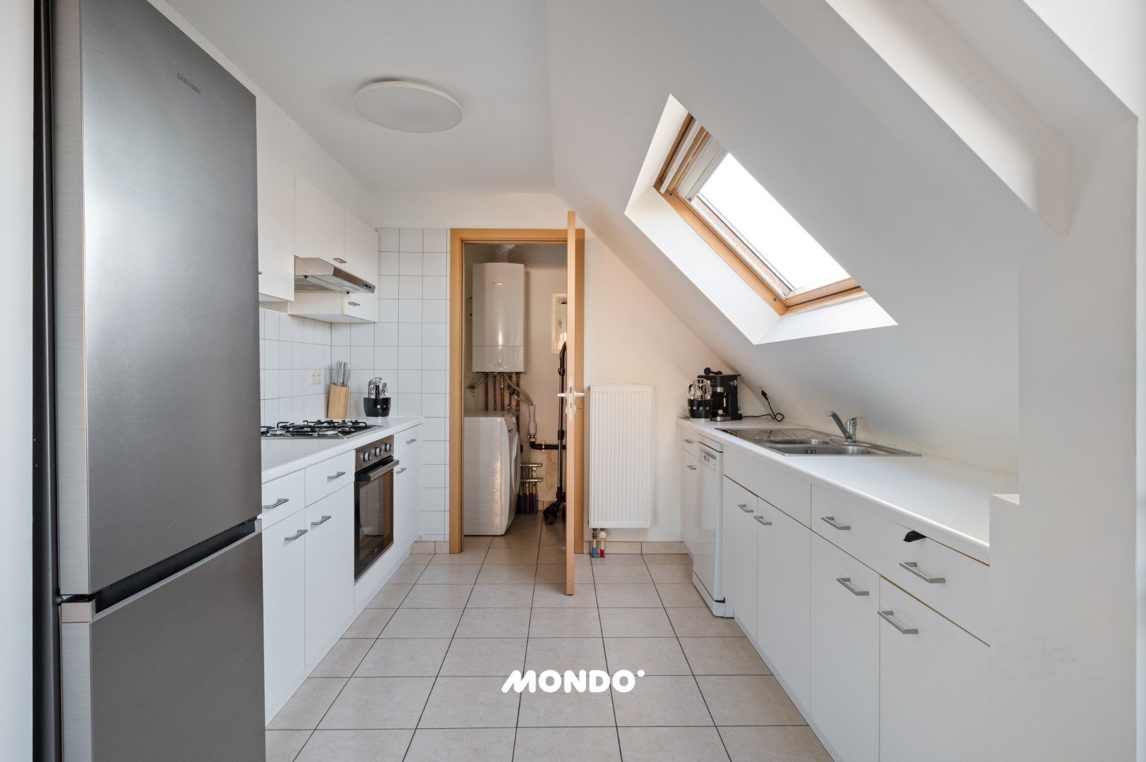 Instapklaar dakappartement met terras in Niel, 1 slaapkamer, bouwjaar 2007, EPC label C, centraal gelegen foto 8