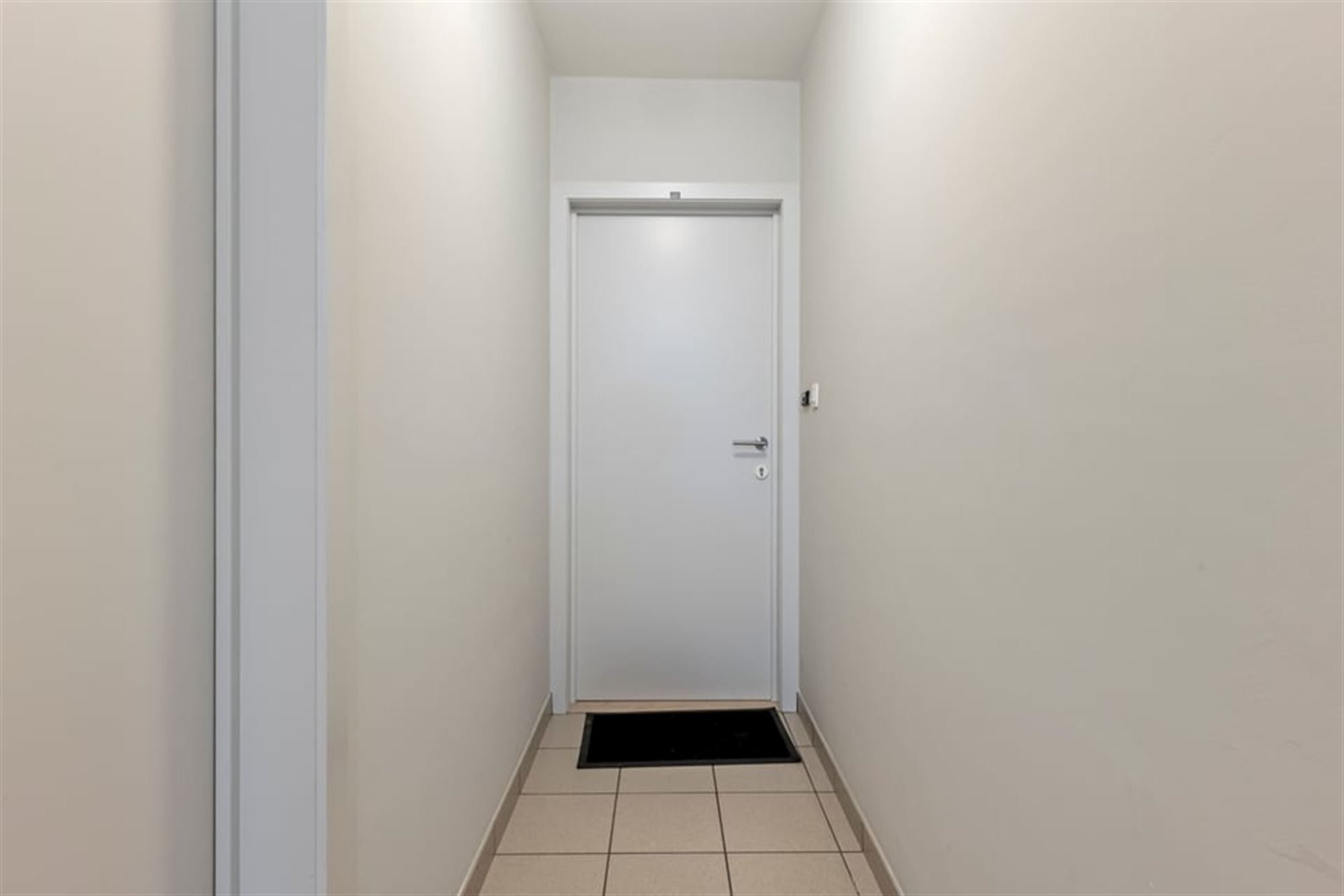 GEZELLIG 2 SLK APPARTEMENT MET STAANPLAATS IN HET CENTRUM VAN SINT-TRUIDEN  foto 21