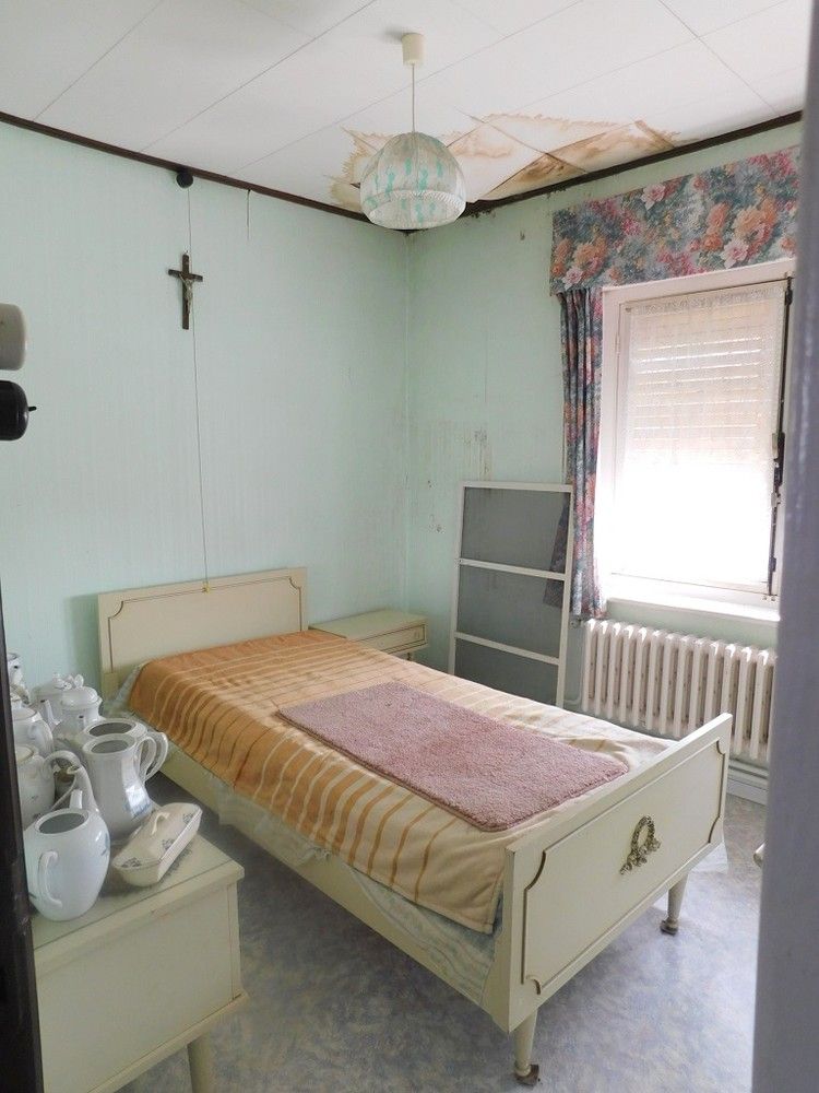 ROESBRUGGE: Grondig te renoveren woonhuis met heel wat ruimte (en dus heel wat mogelijkheden) op een ZW-gericht stuk grond van 454m² totale grondoppervlakte. foto 14