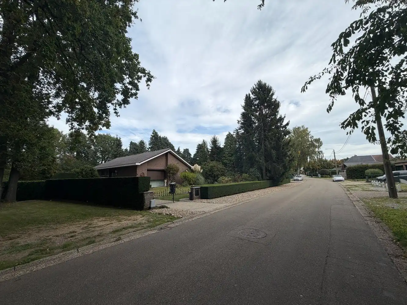 Genk, Brentjesstraat 17 - 19: 2 ruime bouwgronden in een rustige omgeving voor halfopen bebouwing foto 4