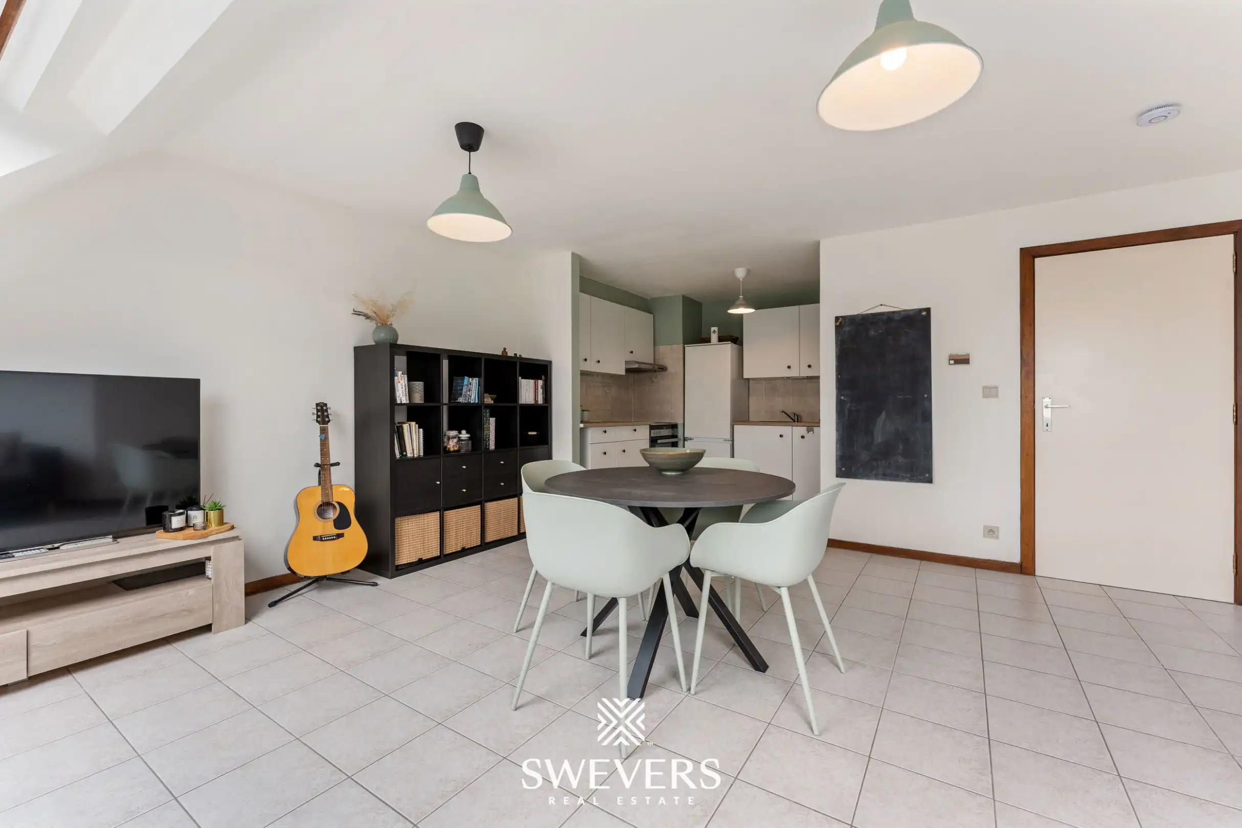 Instapklaar en lichtrijk 1-slaapkamerappartement op topligging in Houthalen centrum foto 7