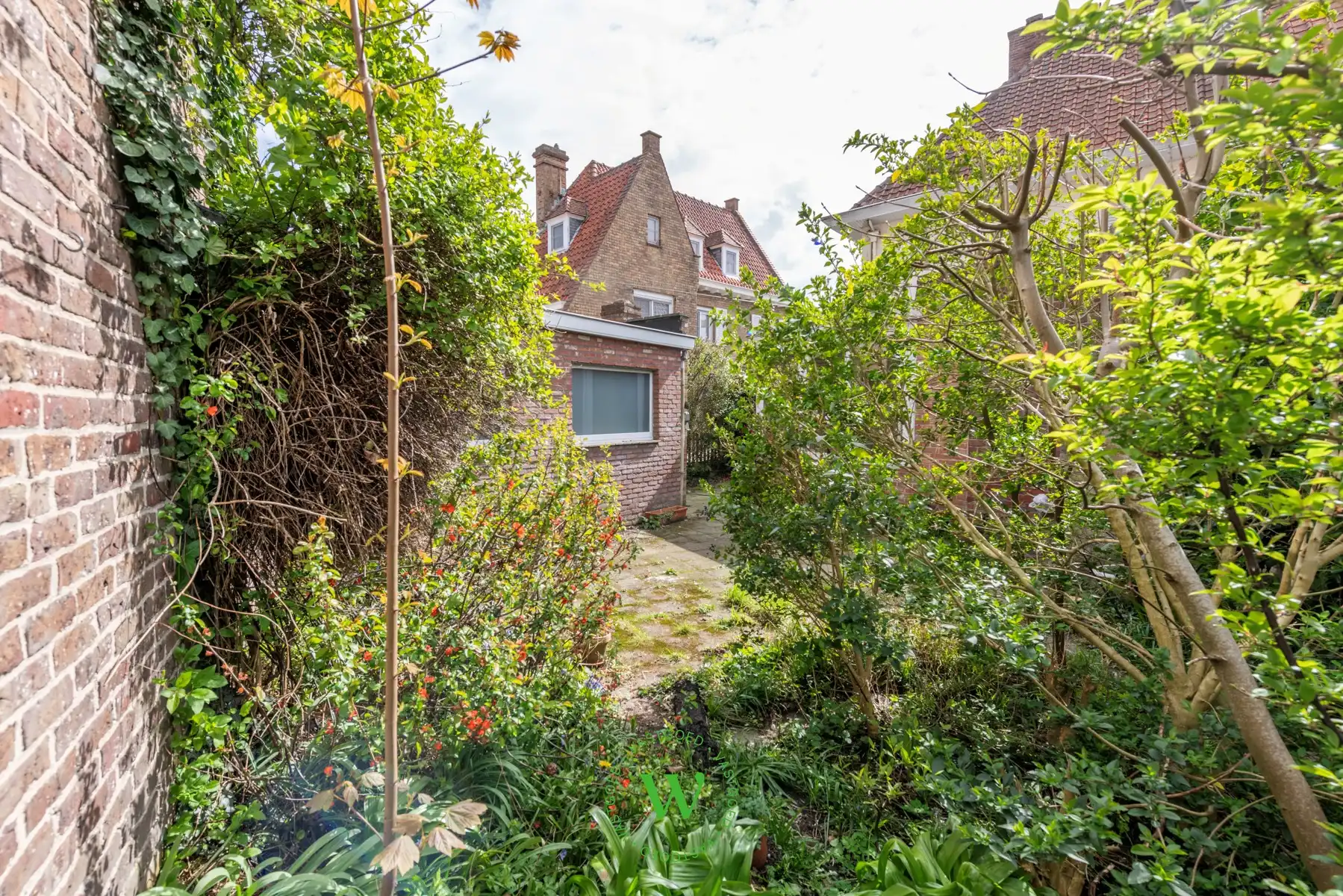 Verrassende en charmante halfopen bebouwing te Assebroek. foto 28