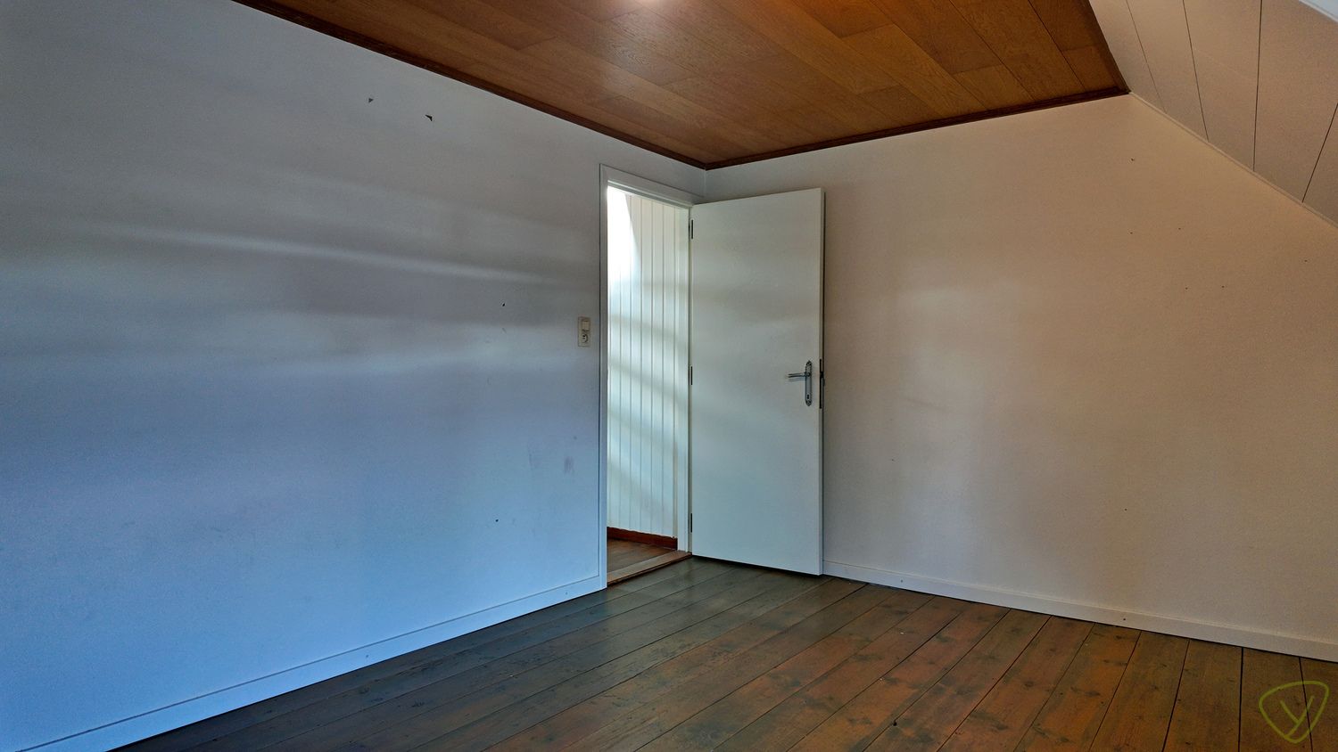 Gezellige stadswoning te huur met ruime garage en parking! foto 16