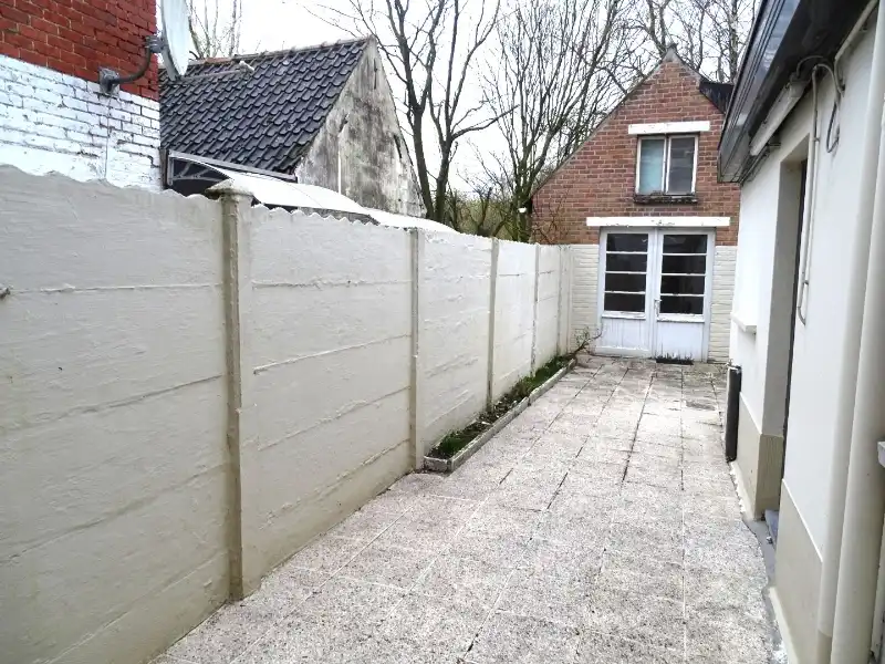 Knusse rijwoning foto 20