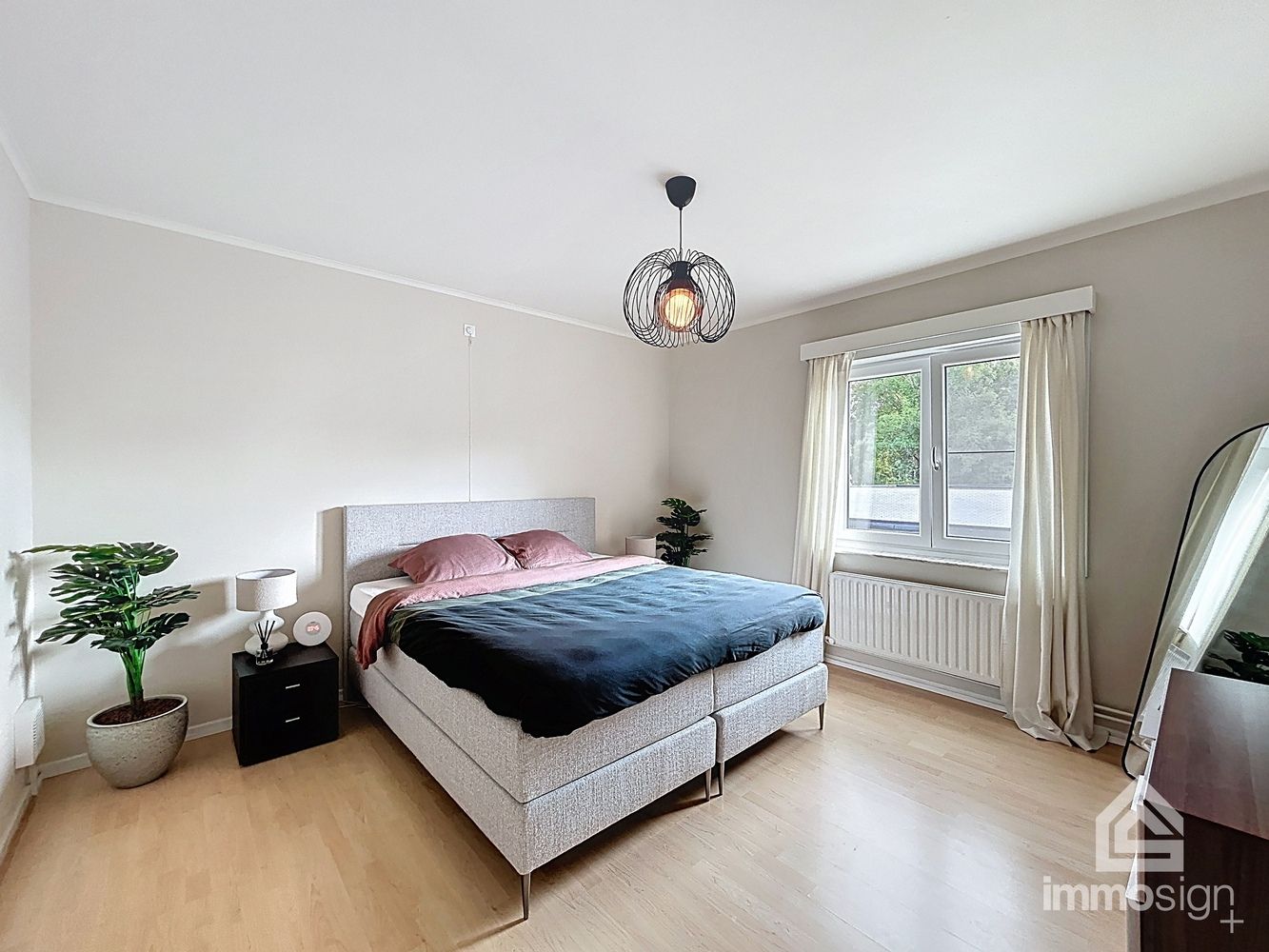 Instapklaar appartement met vernieuwd interieur, 3 slaapkamers en garage in hartje Hamont foto 13