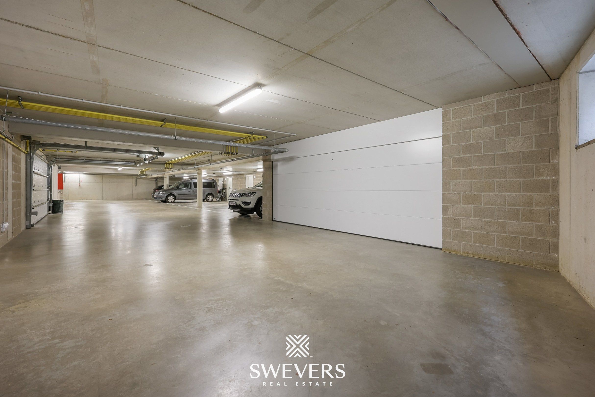 Gelijkvloers appartement met privétuin en dubbele garage foto 18