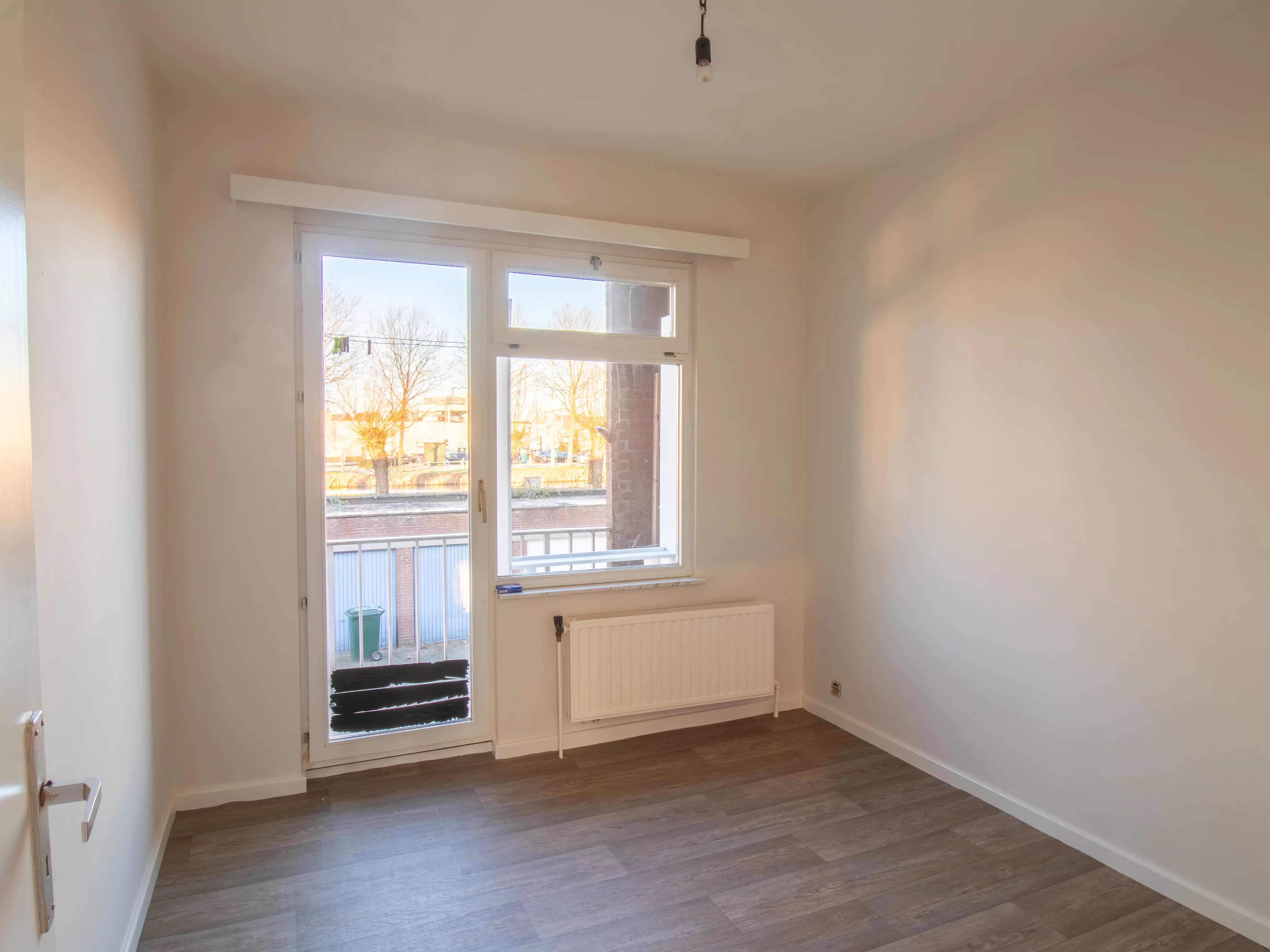 Ruim 2 slaapkamer appartement met garage en zicht op water foto 9