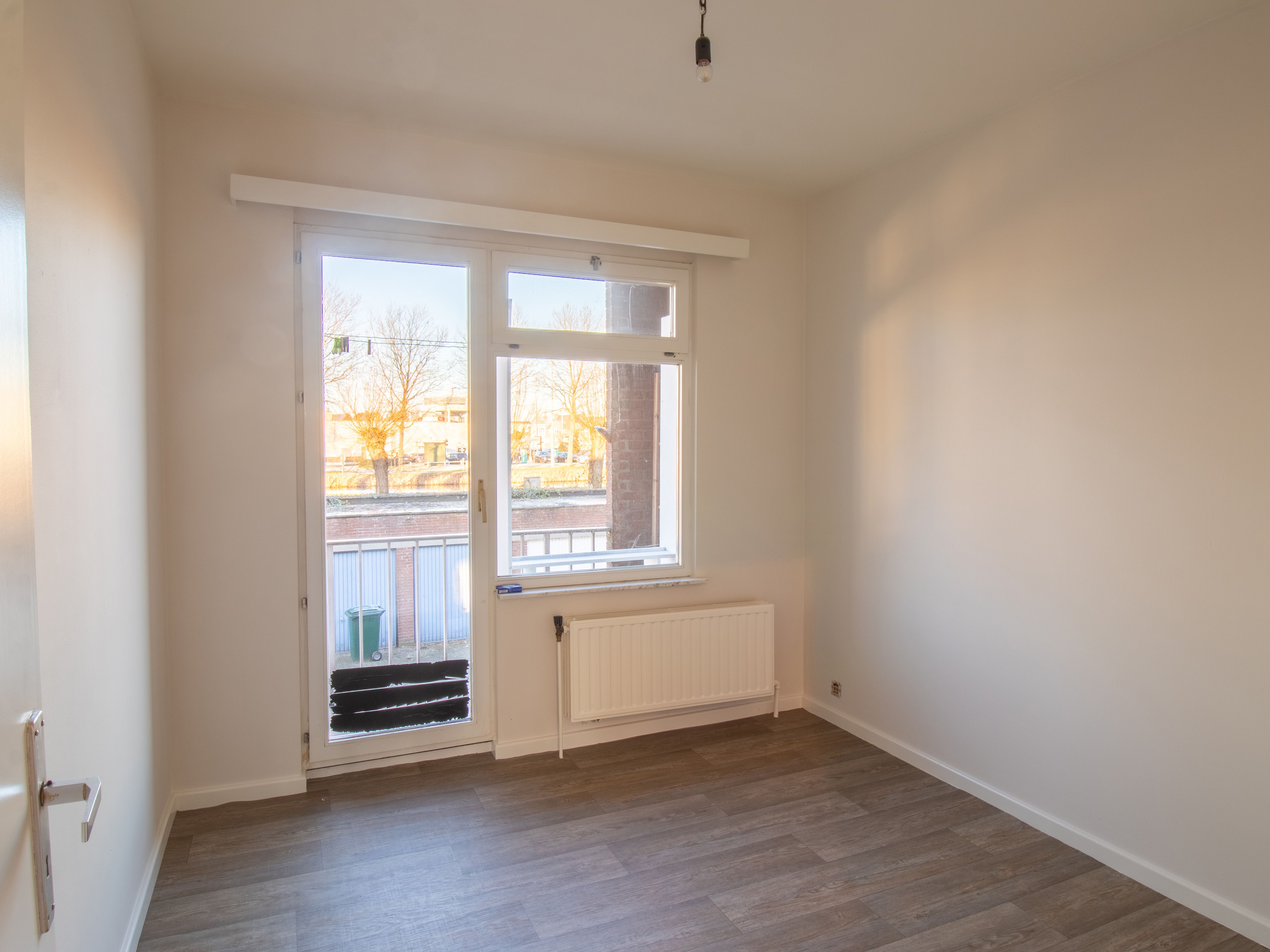 Ruim 2 slaapkamer appartement met garage en zicht op water foto 9