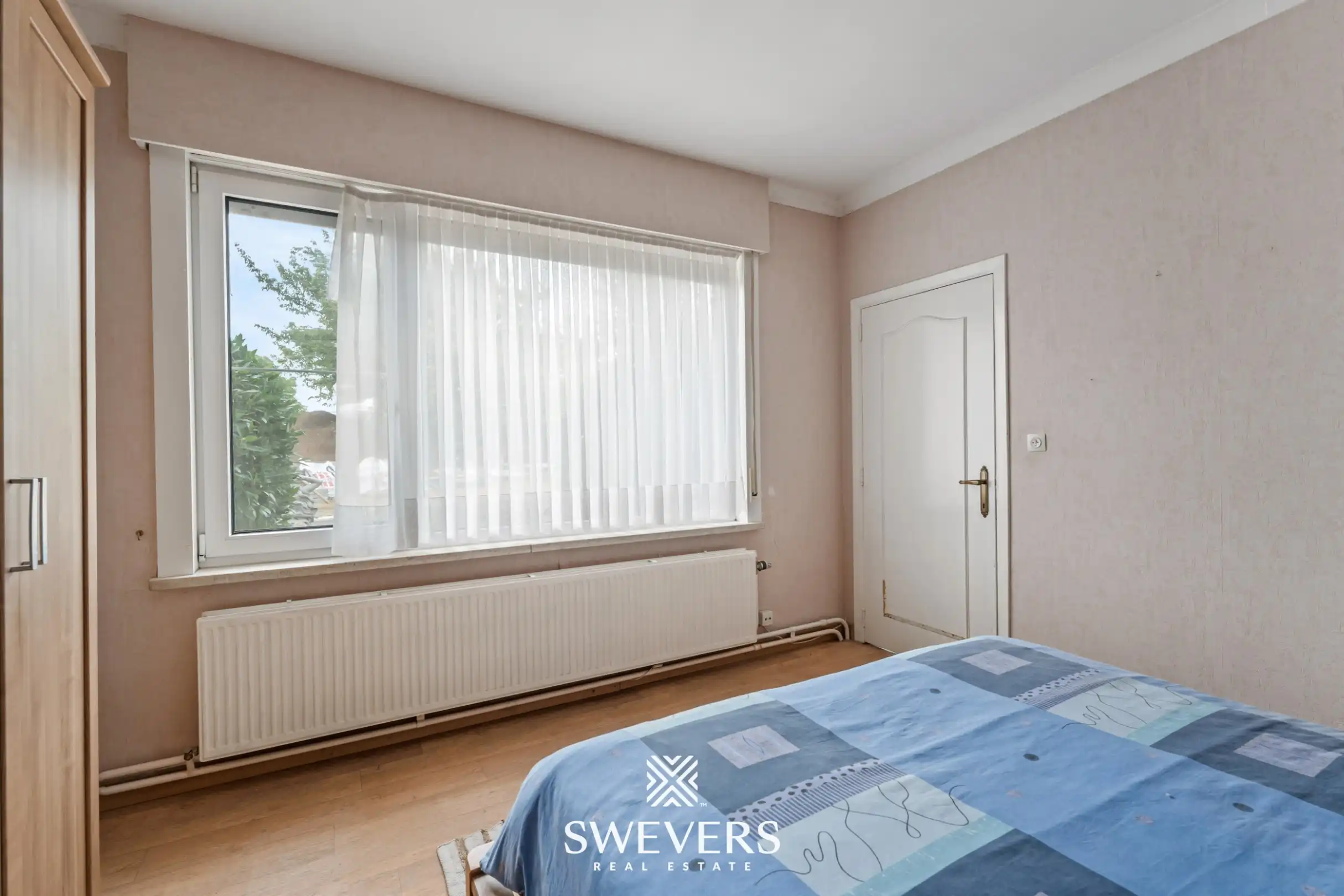 Op te knappe woning met 3 ruime slaapkamers in rustige straat te Gingelom foto 13