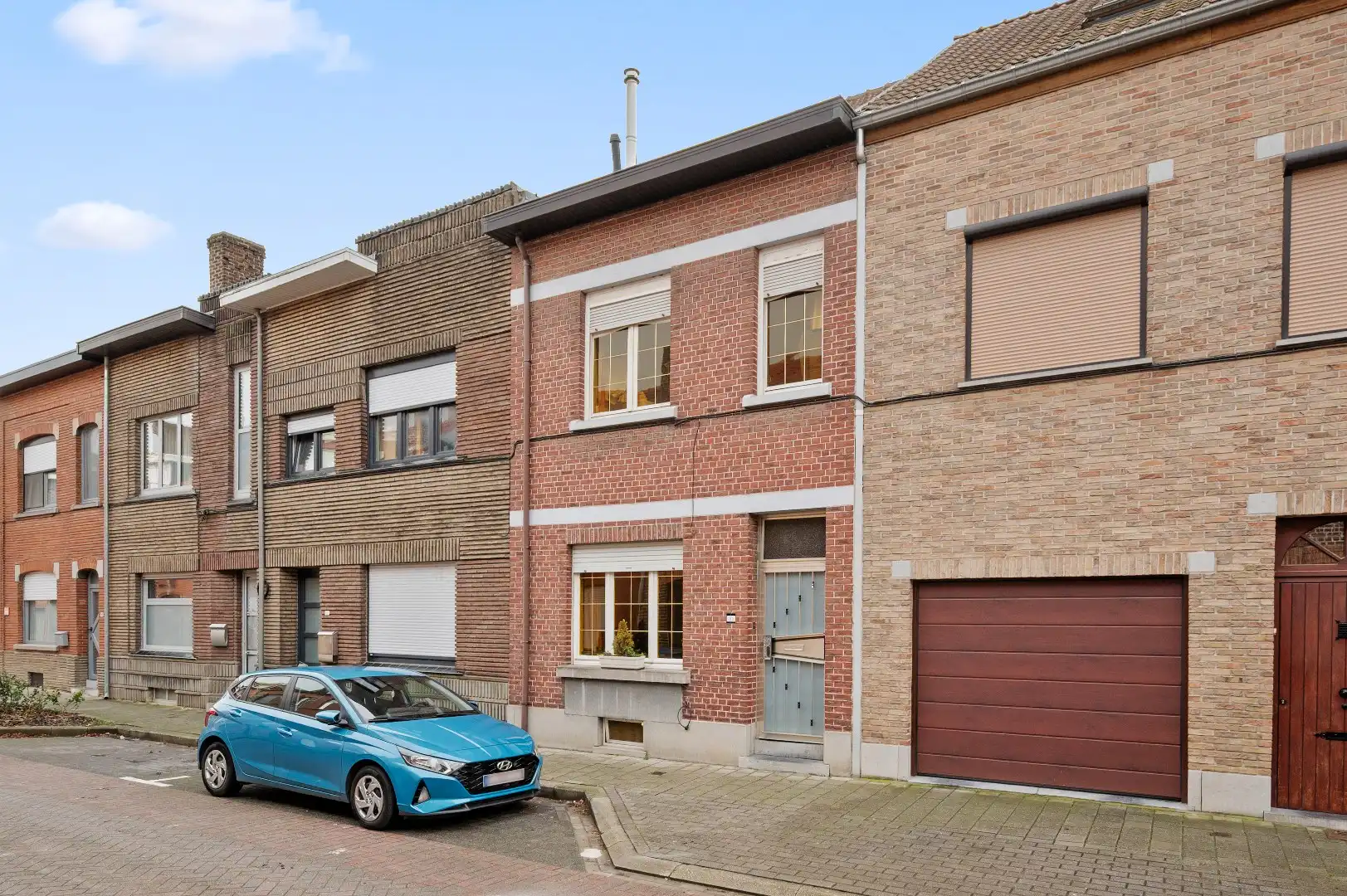 Instapklare rijwoning met 3 slaapkamers en een ruime tuin op de Tiense stadsrand. foto 22