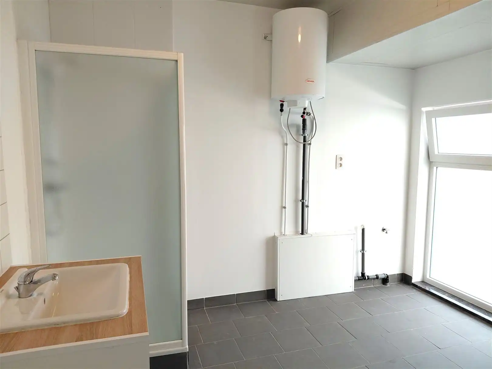 TE HUUR: Gesloten bebouwing met 2 slaapkamers in het centrum van Heusden! foto 10