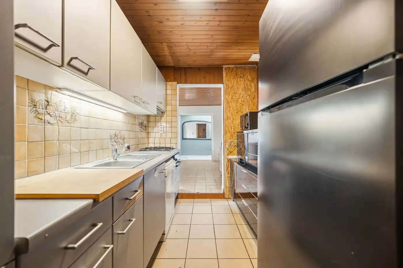 Verder te renoveren woning met grote hangar met 3 slpks foto 10