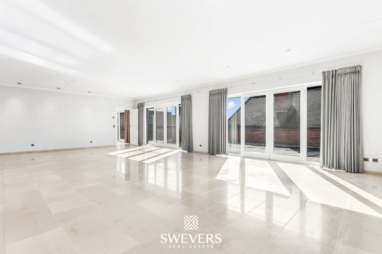 Handelspand met ruime woning in hartje Lummen – een unieke opportuniteit foto 2