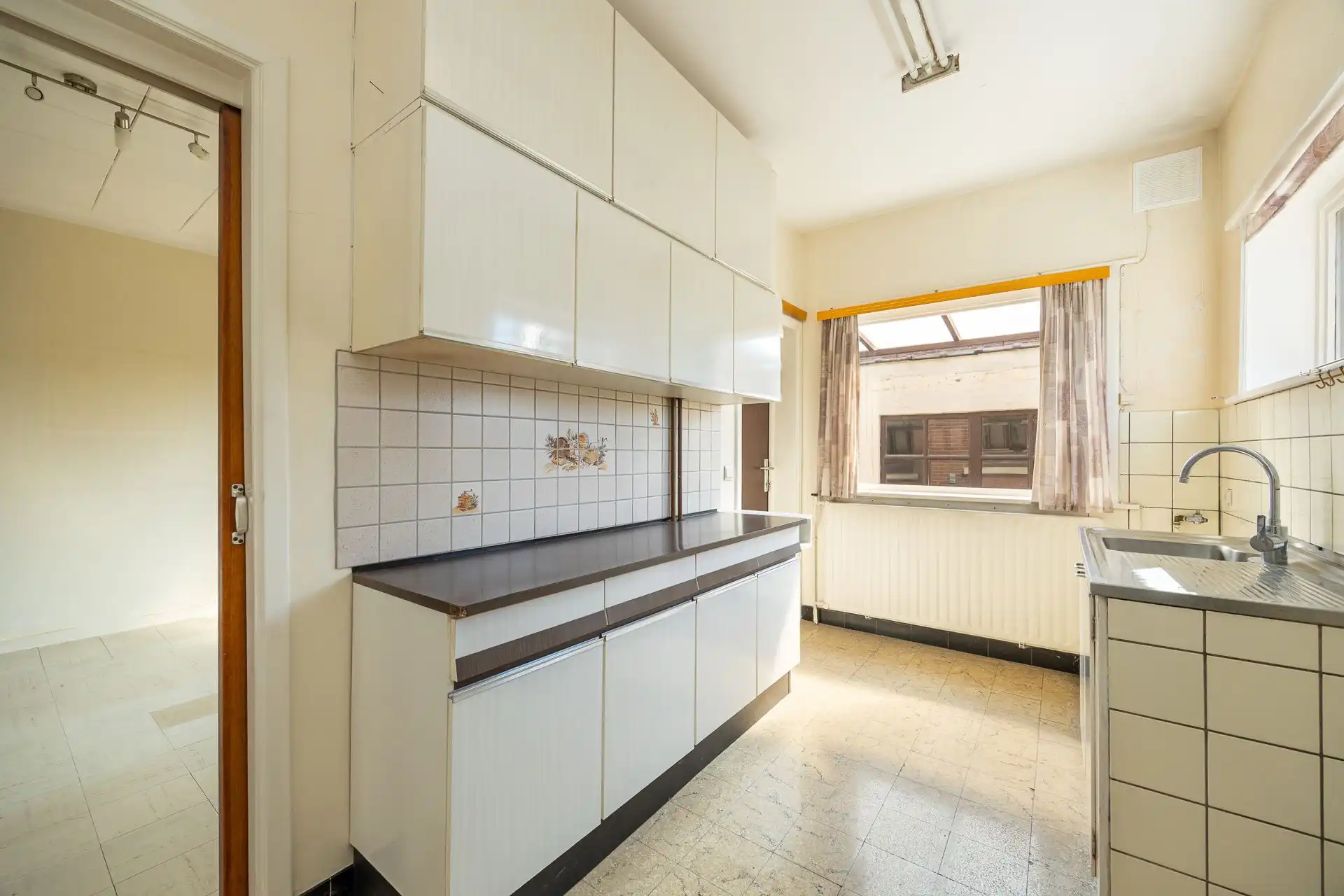 Ruime halfopen bebouwing met 5 slaapkamers, garage en zonnige tuin op toplocatie! foto 13