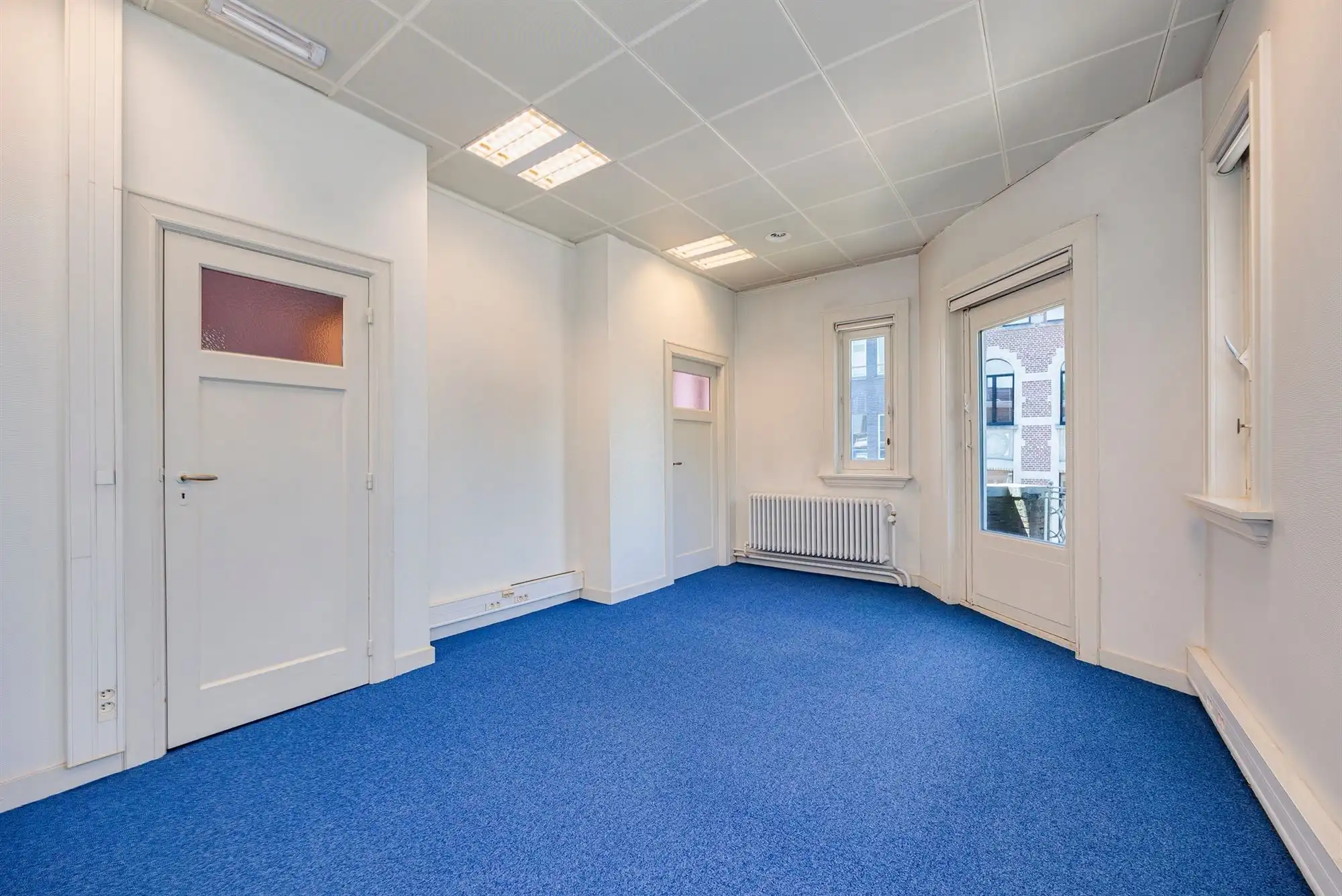 Prachtige handelswoning met betrouwbare huurder op handelslocatie! foto 12