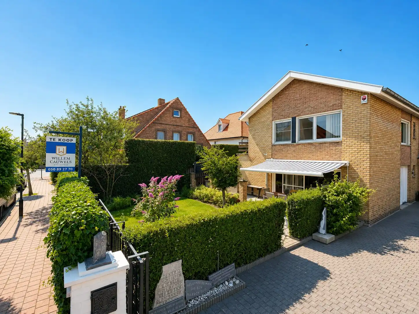 Alleenstaande woning in een rustige straat te Heist-aan-Zee foto {{pictureIndex}}