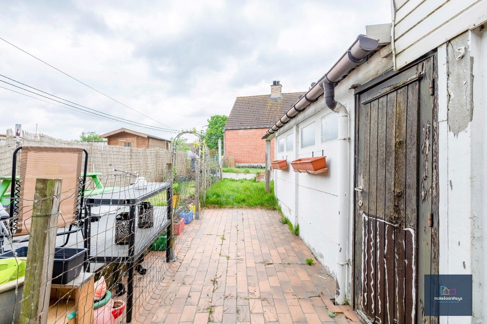 Rijwoning met tuin te Wetteren.  foto 17