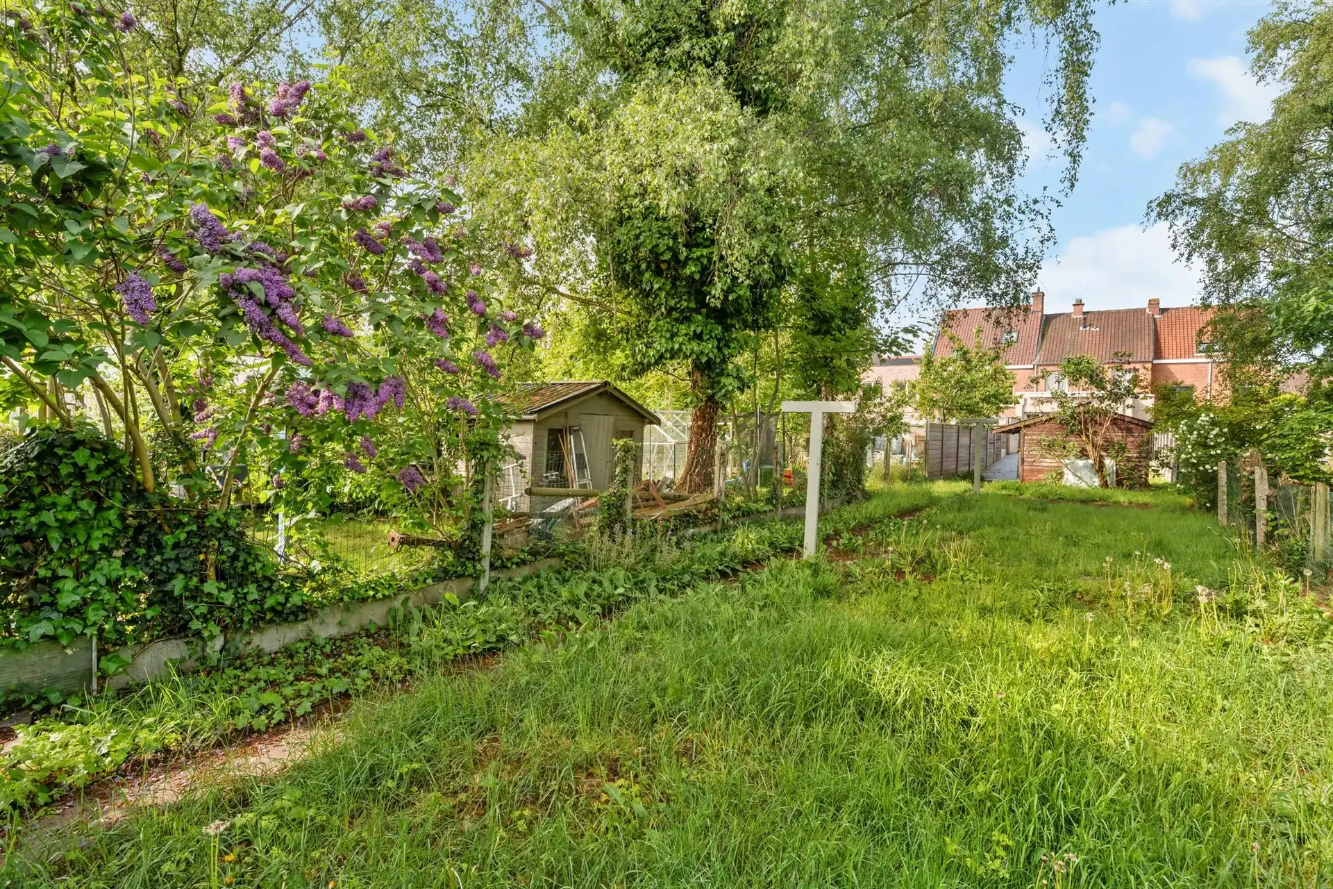 Ruime instapklare woning met 4 slpk, garage en tuin in Heule foto 10