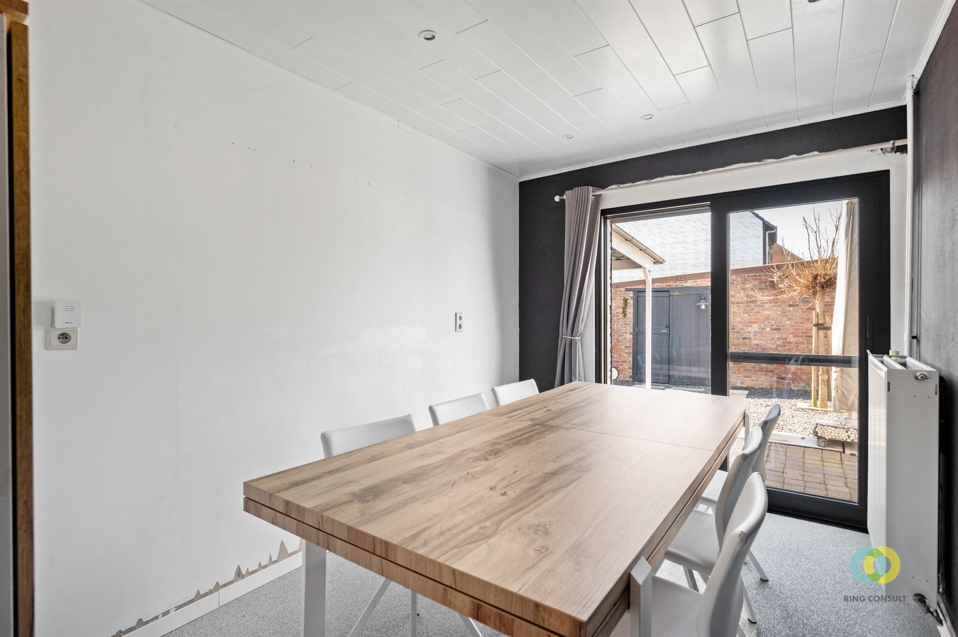 Woning met tuin en carport foto 12