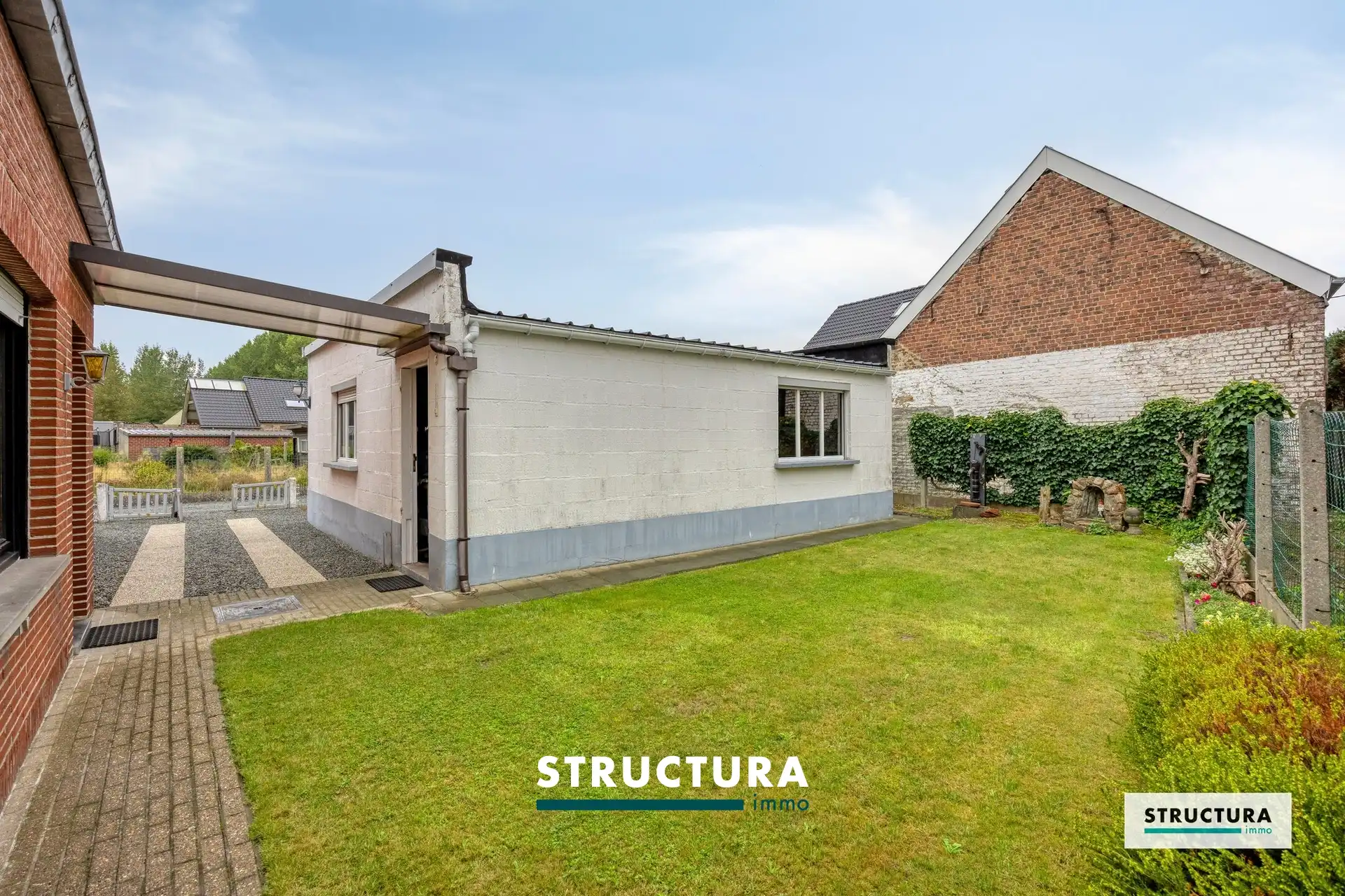 Woning met tuin en garage/atelier, gelgen in alle rust! foto 7