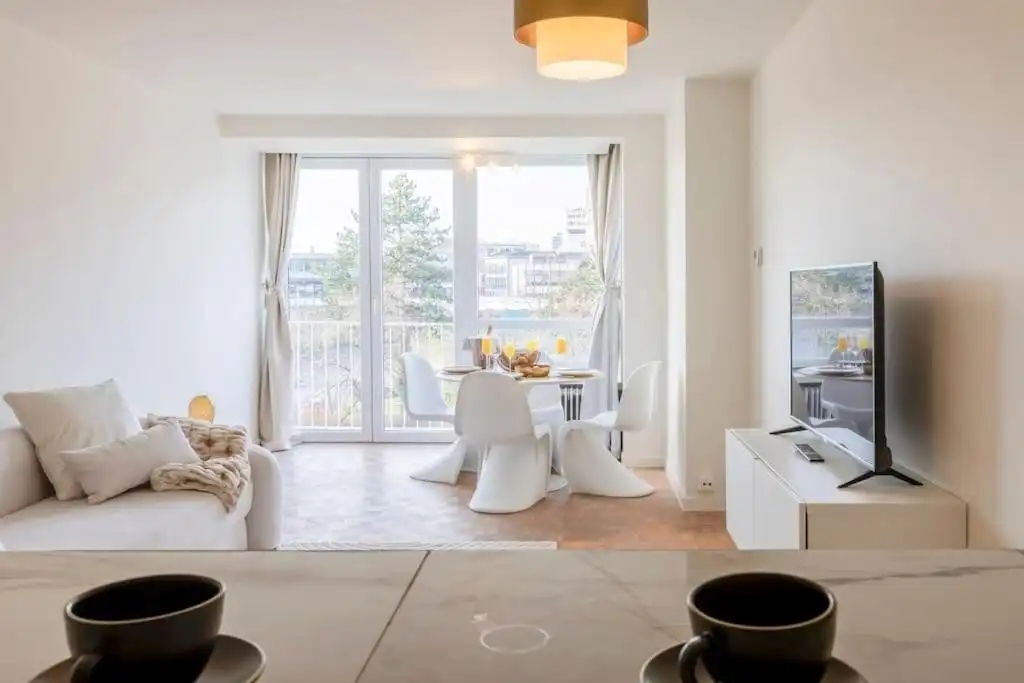 Stijlvol gerenoveerd 1-slaapkamerappartement aan het water in hartje Gent foto 2