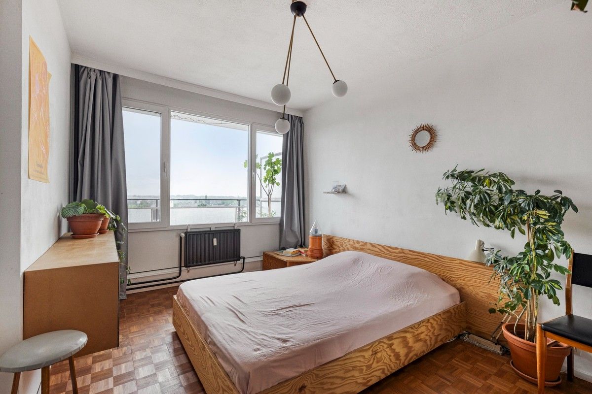 Verzorgd en instapklaar 1-slaapkamerappartement met rustgevend uitzicht op de Leiekaai foto 6