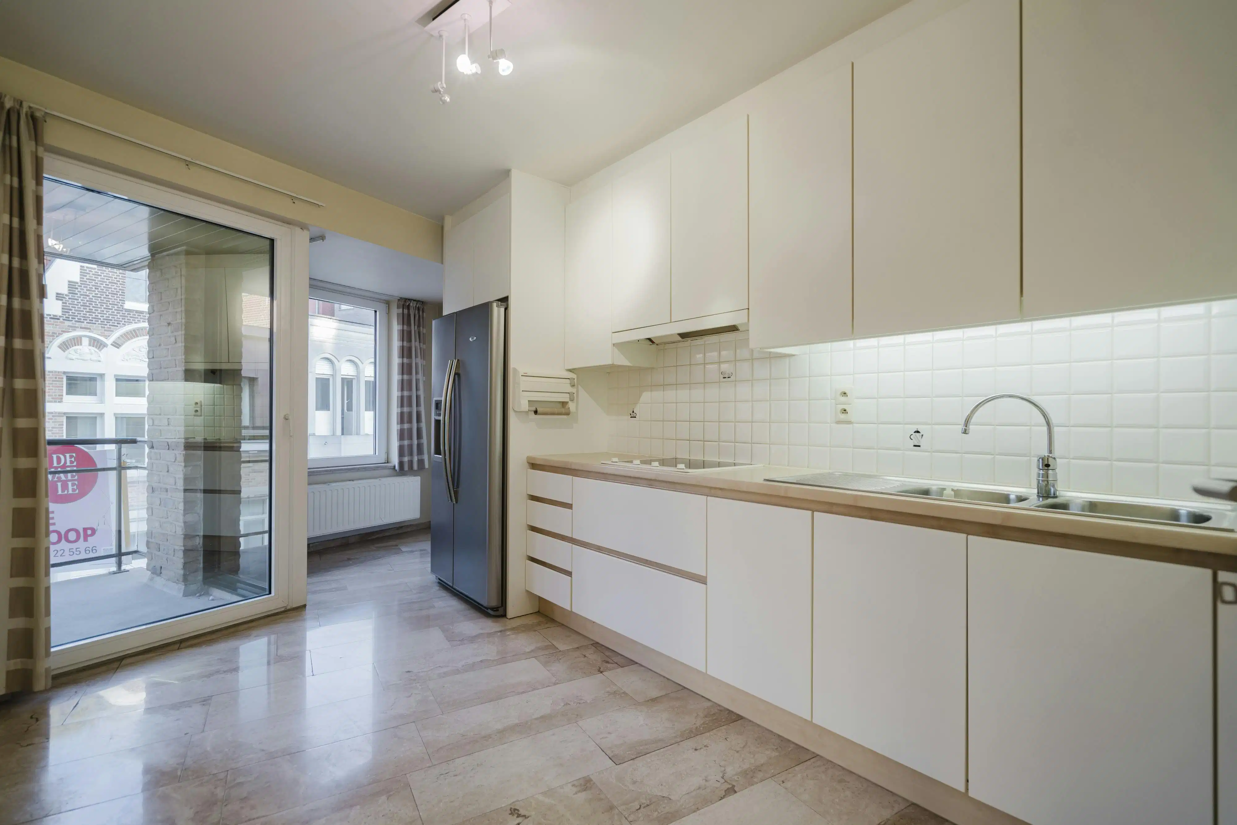 Ruim 3-slpk app. met garage in hartje Kortrijk foto 5