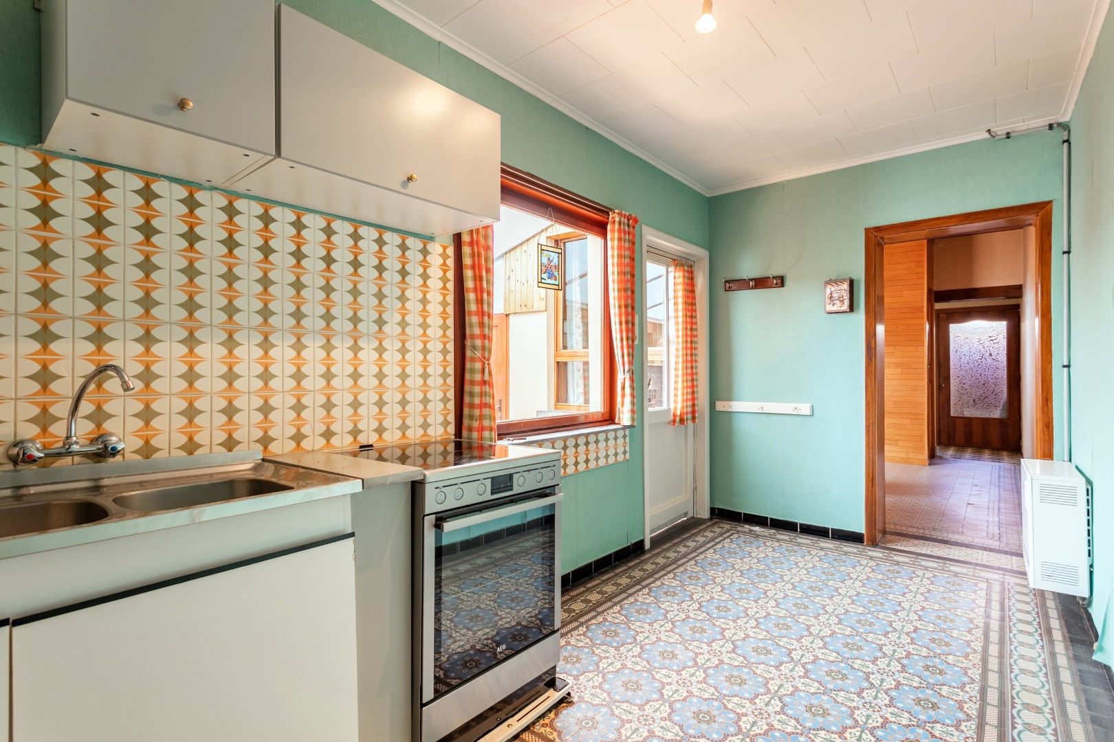 Te renoveren 3-gevelwoning met 3 slaapkamers en tuin foto 8