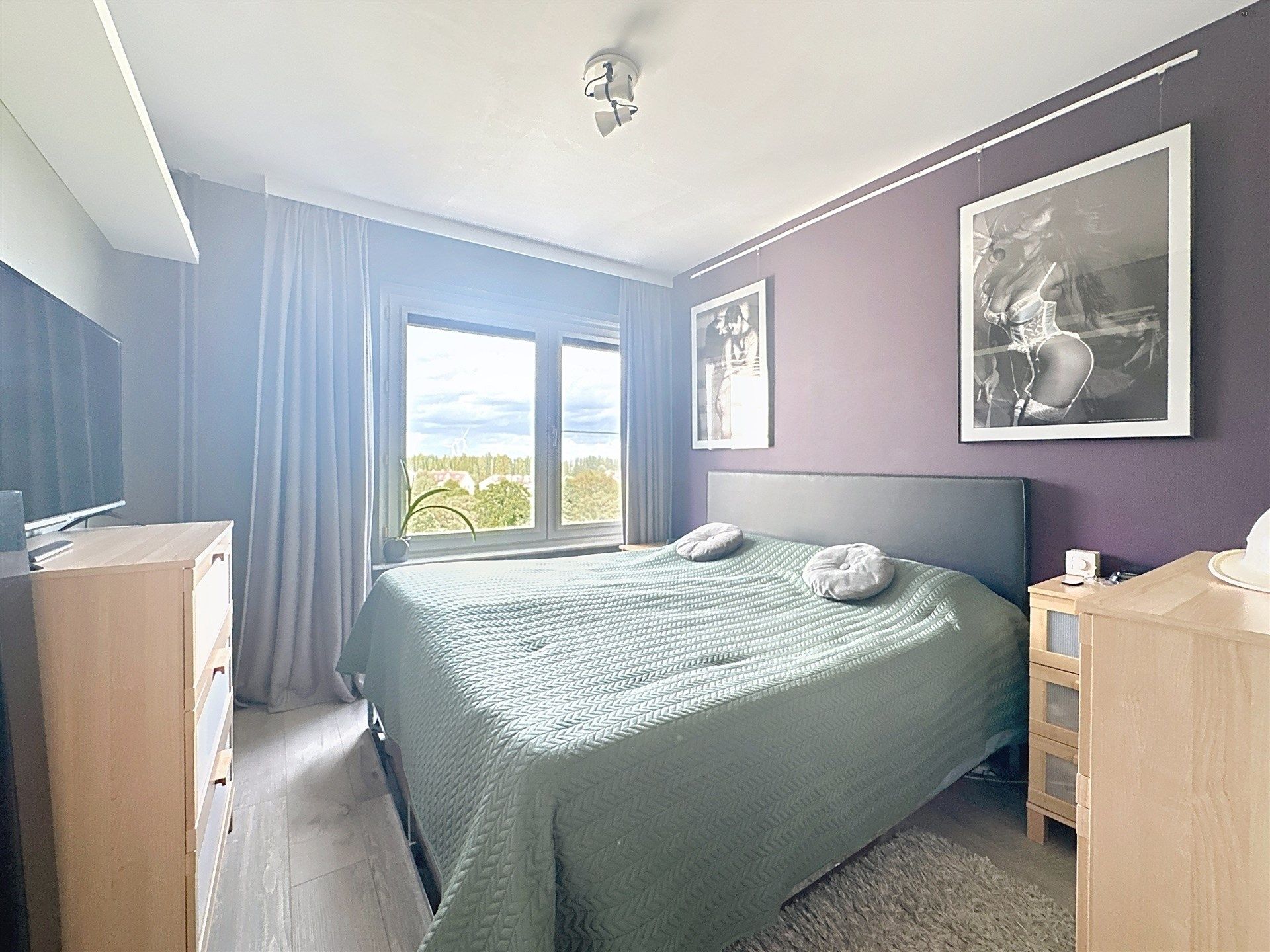 Ruim en lichtrijk 3 slpk hoekappartement met een fantastisch uitzicht. foto 10